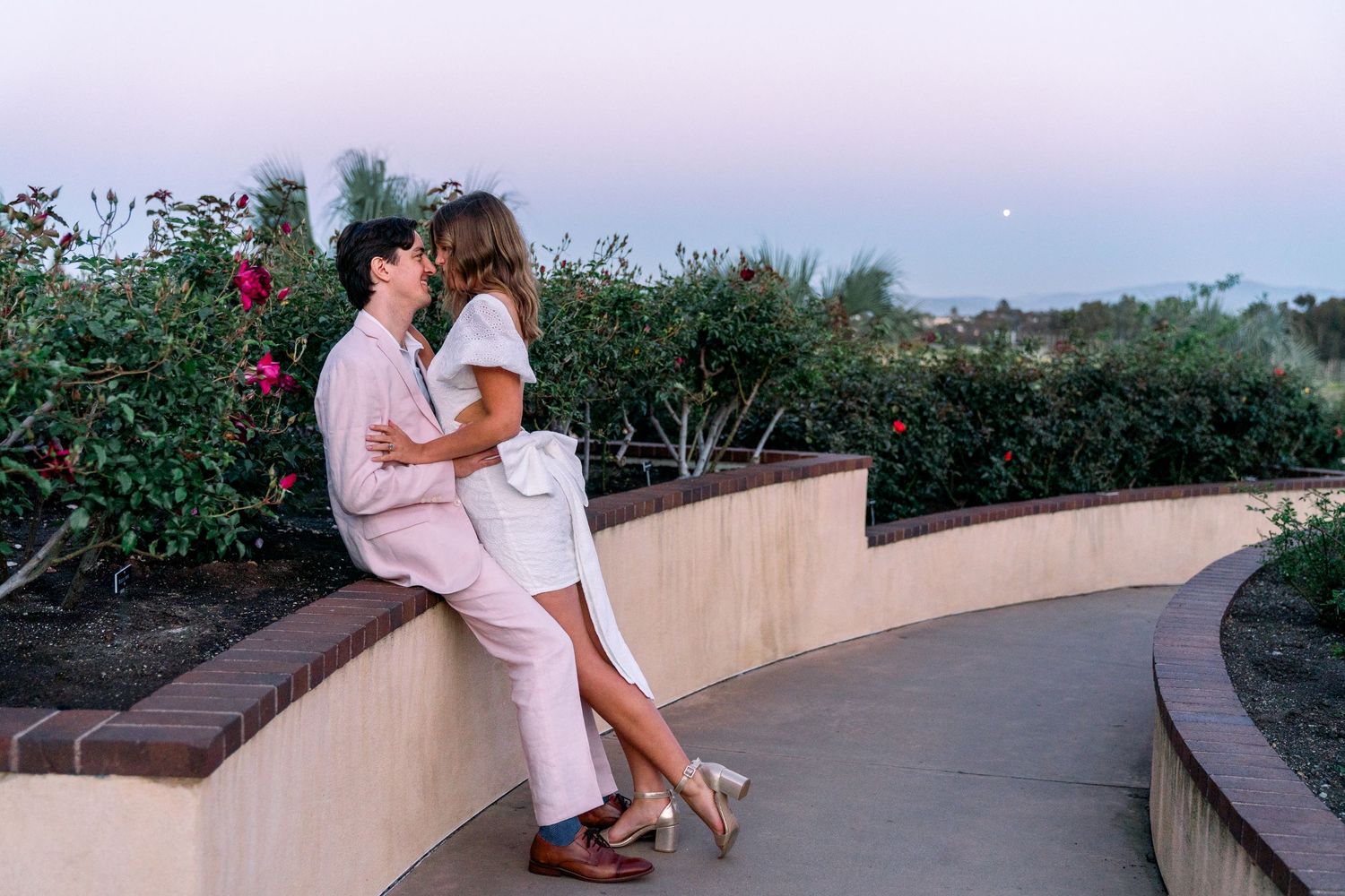 San Diego Bride and Groom Engaged At Balboa Park Kissing Luxury Southern California WEdding Photographer