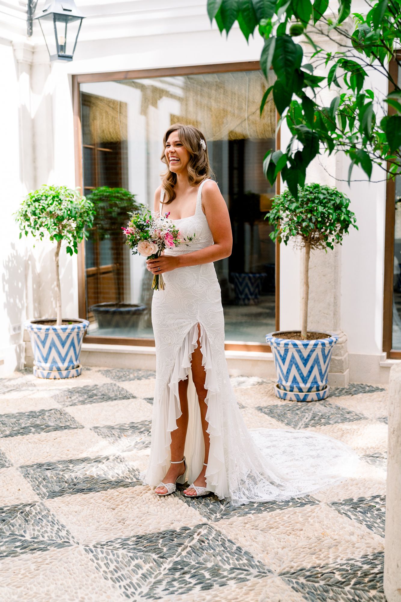 First look in a beautiful hotel in Spain, captured by a San Diego wedding photographer.