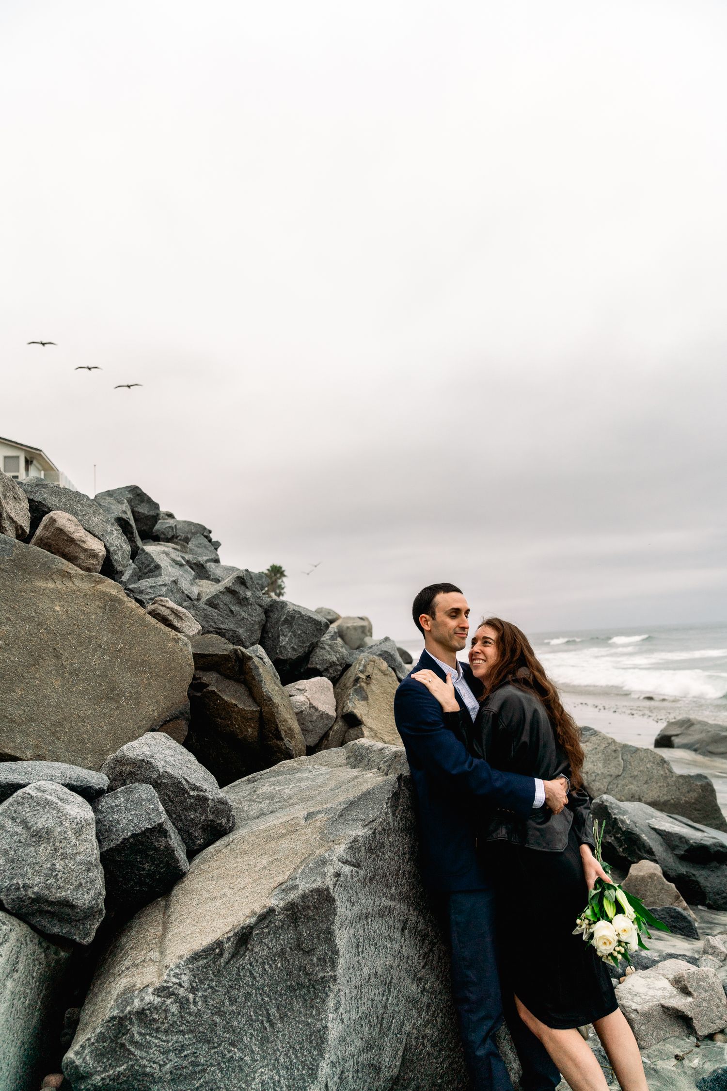 Engagement photos at the beach with a San Diego wedding photographer - at carlsbad state beach
