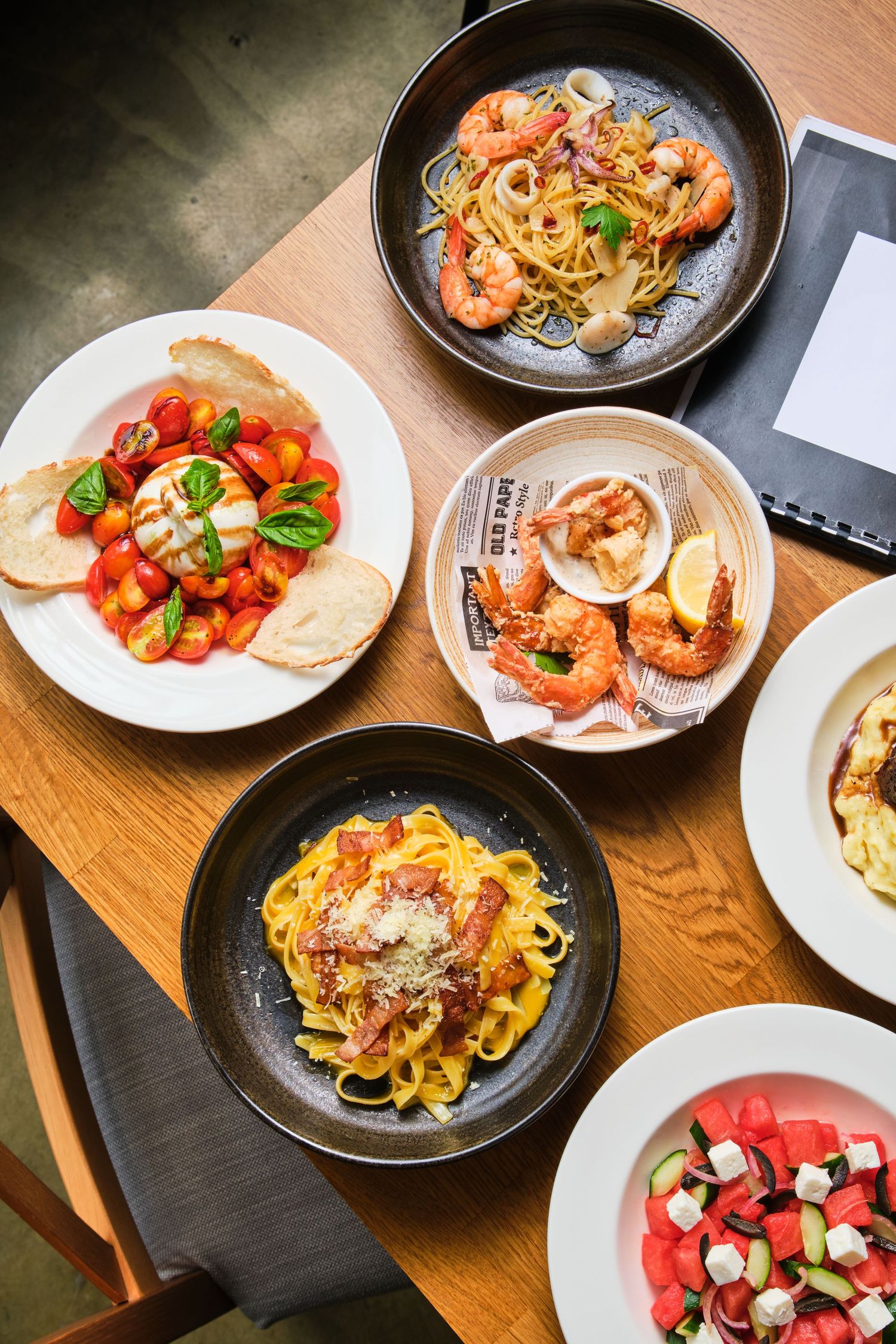 Italian dishes on a wooden table