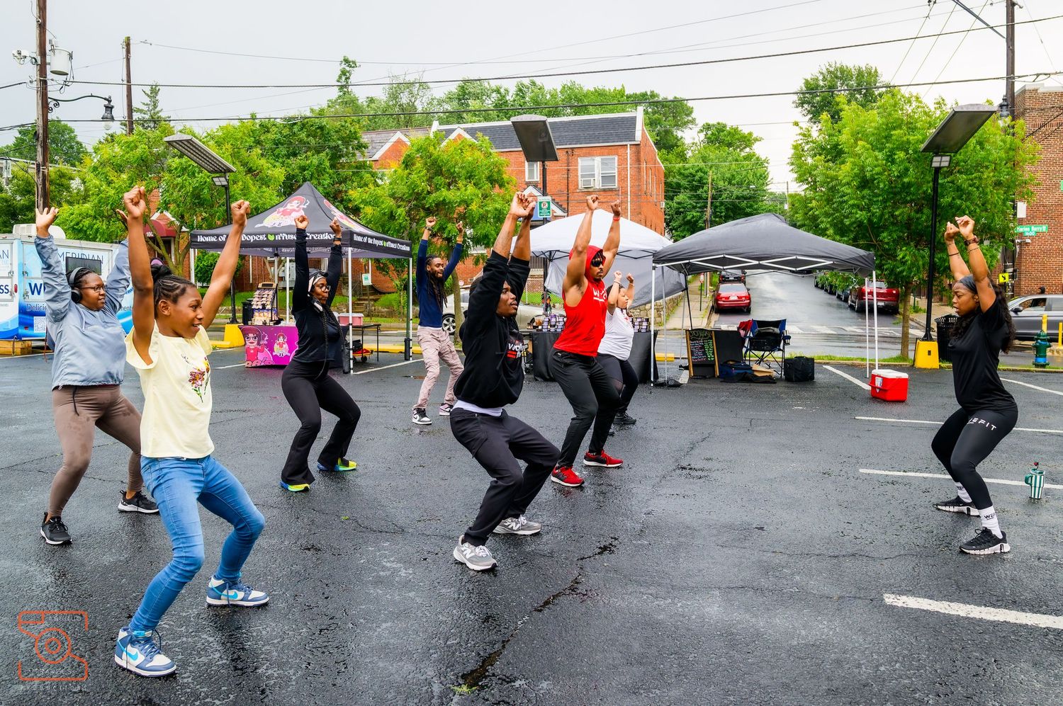 A sequence of dance moves showing people performing line dance steps on a paved outdoor area.