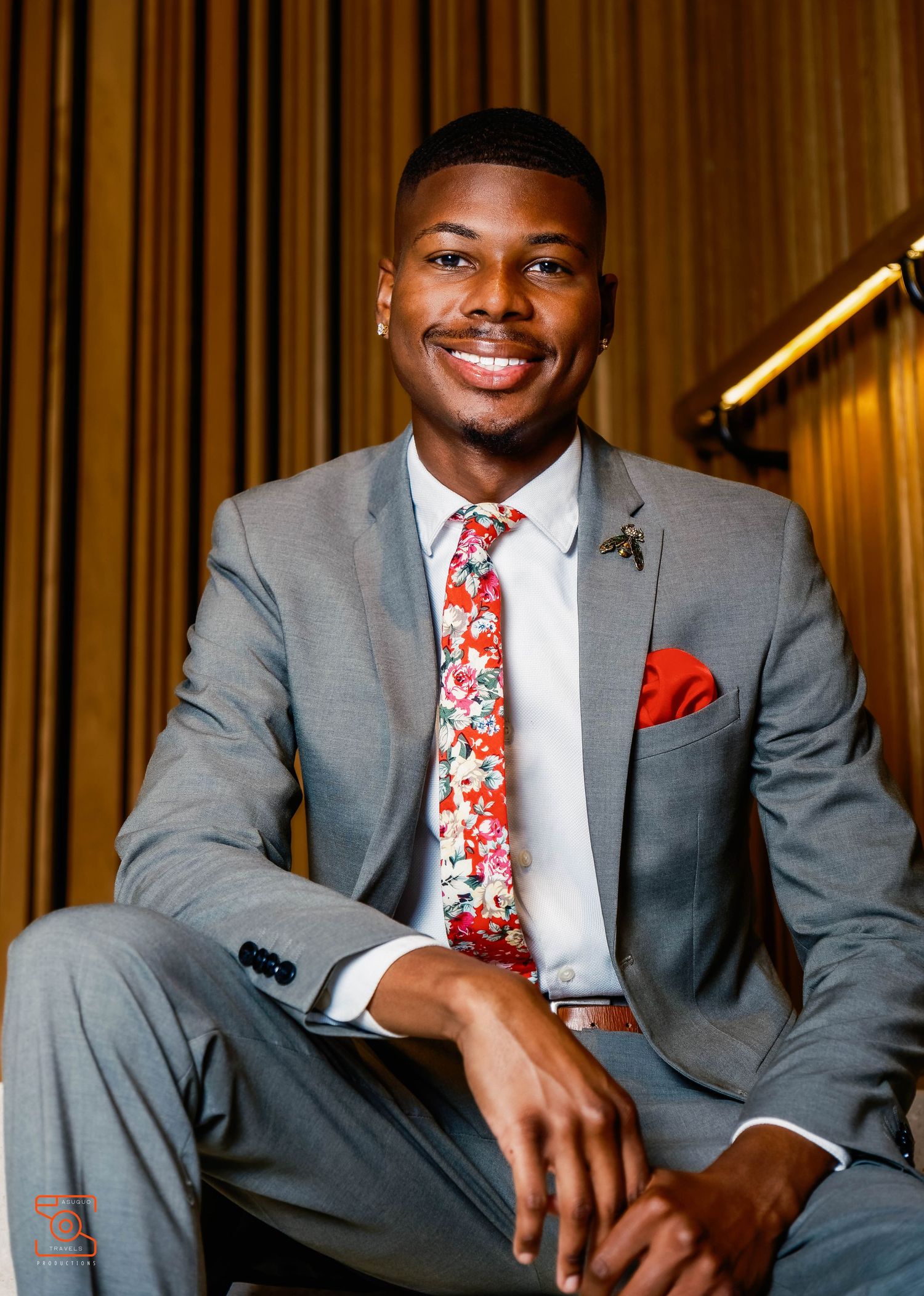 Formal portrait series featuring gray suits with floral ties and pocket squares.