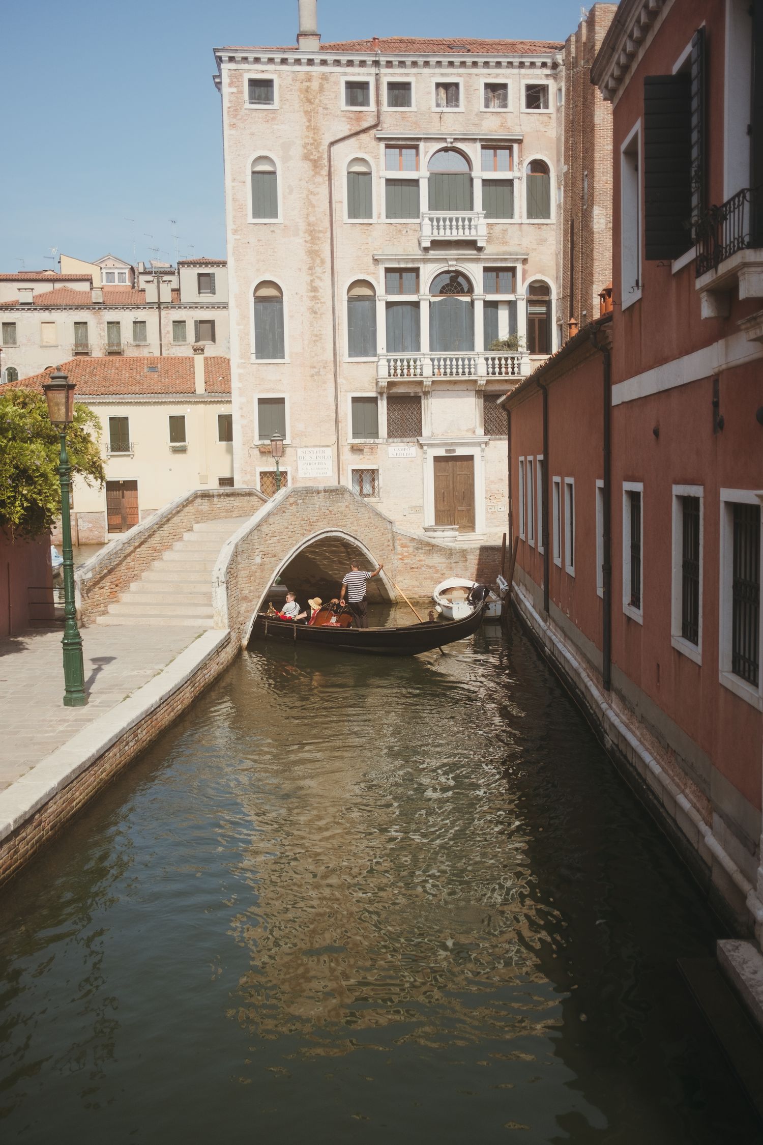 Scenic view of Venice canals with traditional architecture and bridges.