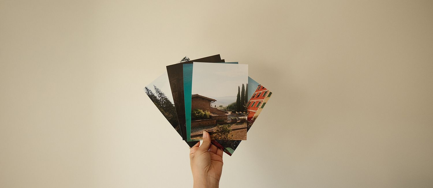 Abstract minimalist photo sequence showing hands against a beige background.