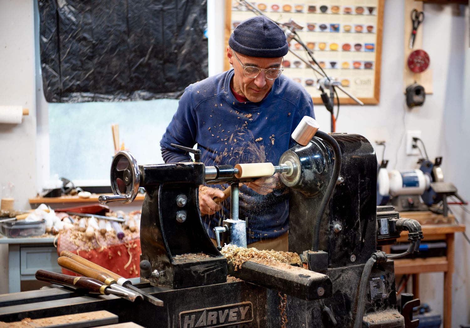 world renowned wood turner turning wood in a wood shop with wood working tools and lathe located in Turner, OR