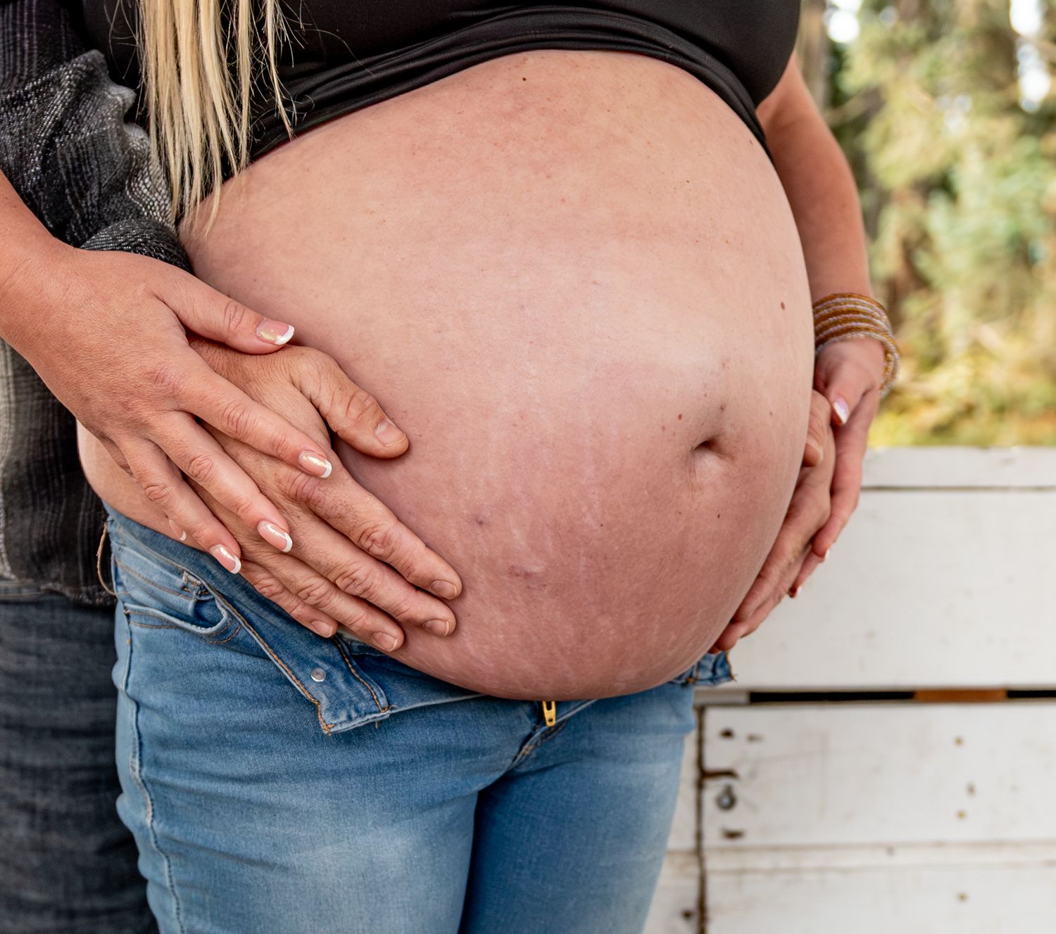Detailed maternity image of mom and dad holding mom's belly, Stayton, OR