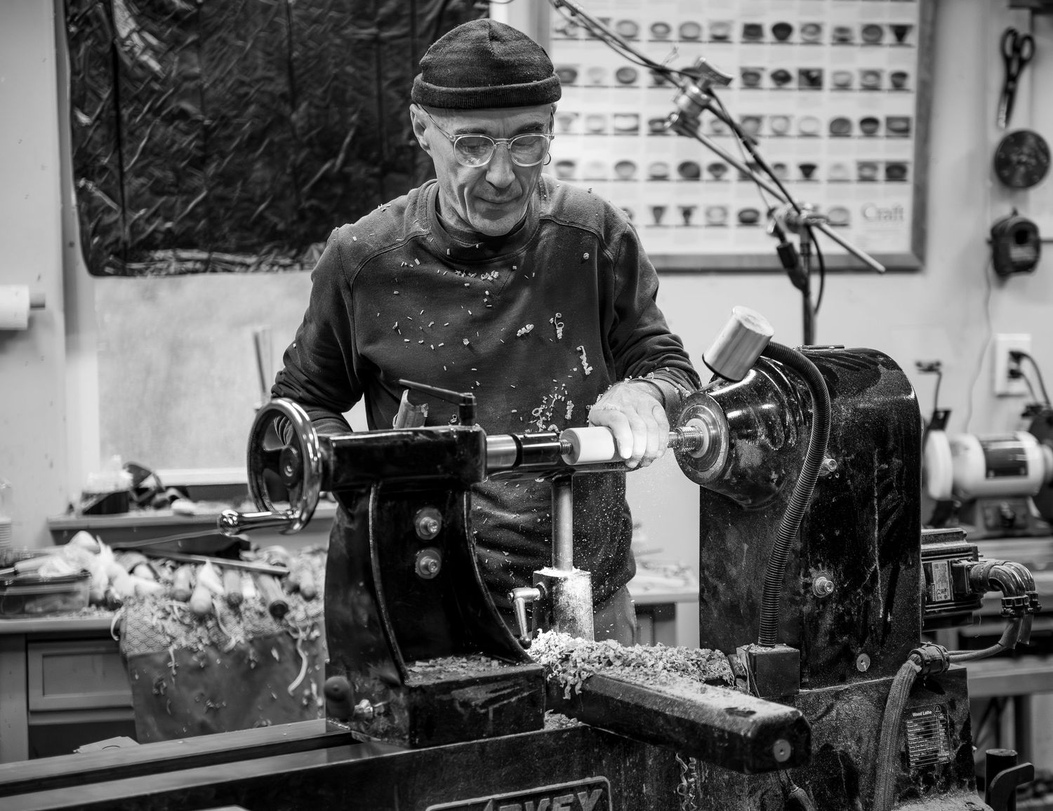 world renowned wood turner turning wood in a wood shop with wood working tools and lathe located in Turner, OR