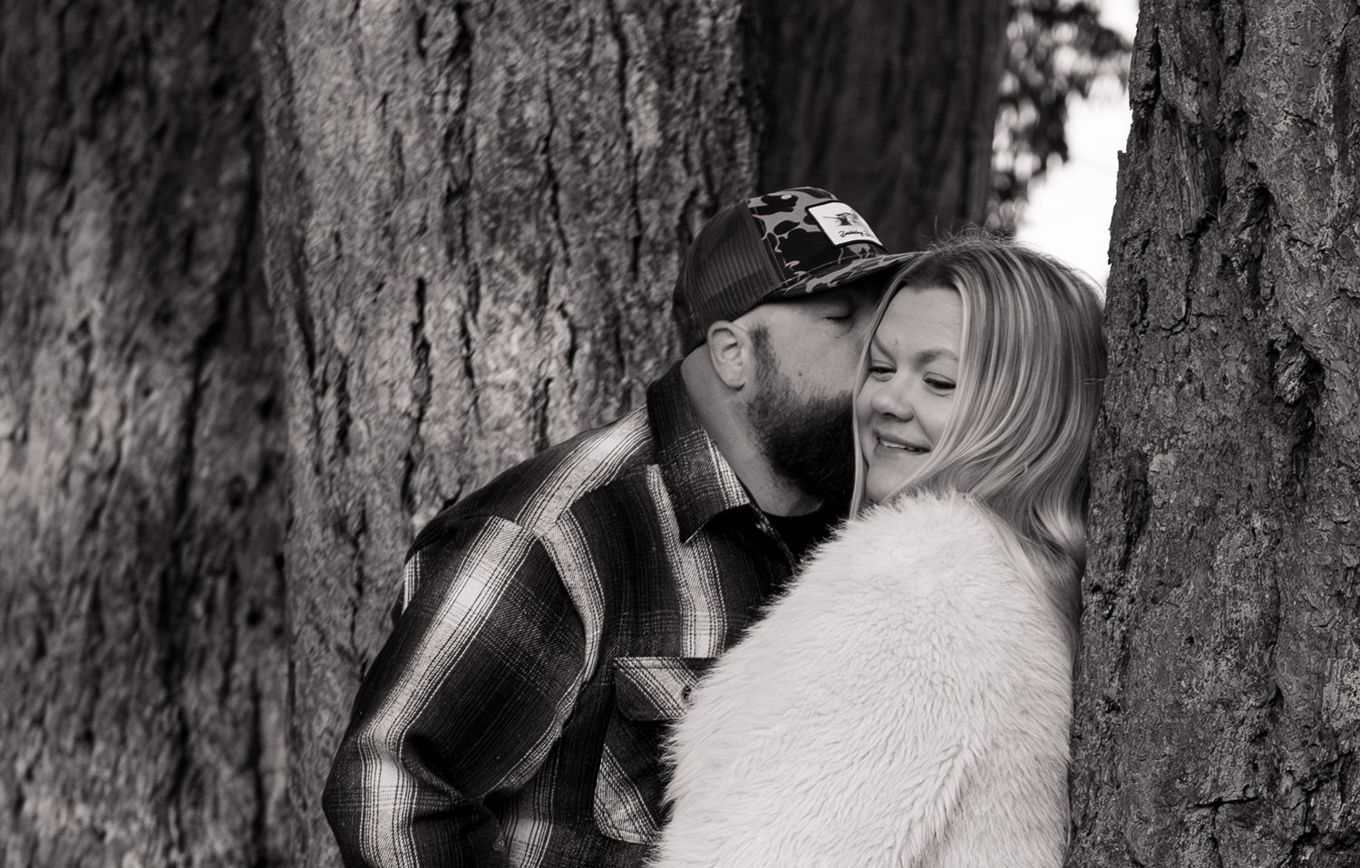 Detailed maternity image of mom and dad embracing each other Stayton, OR