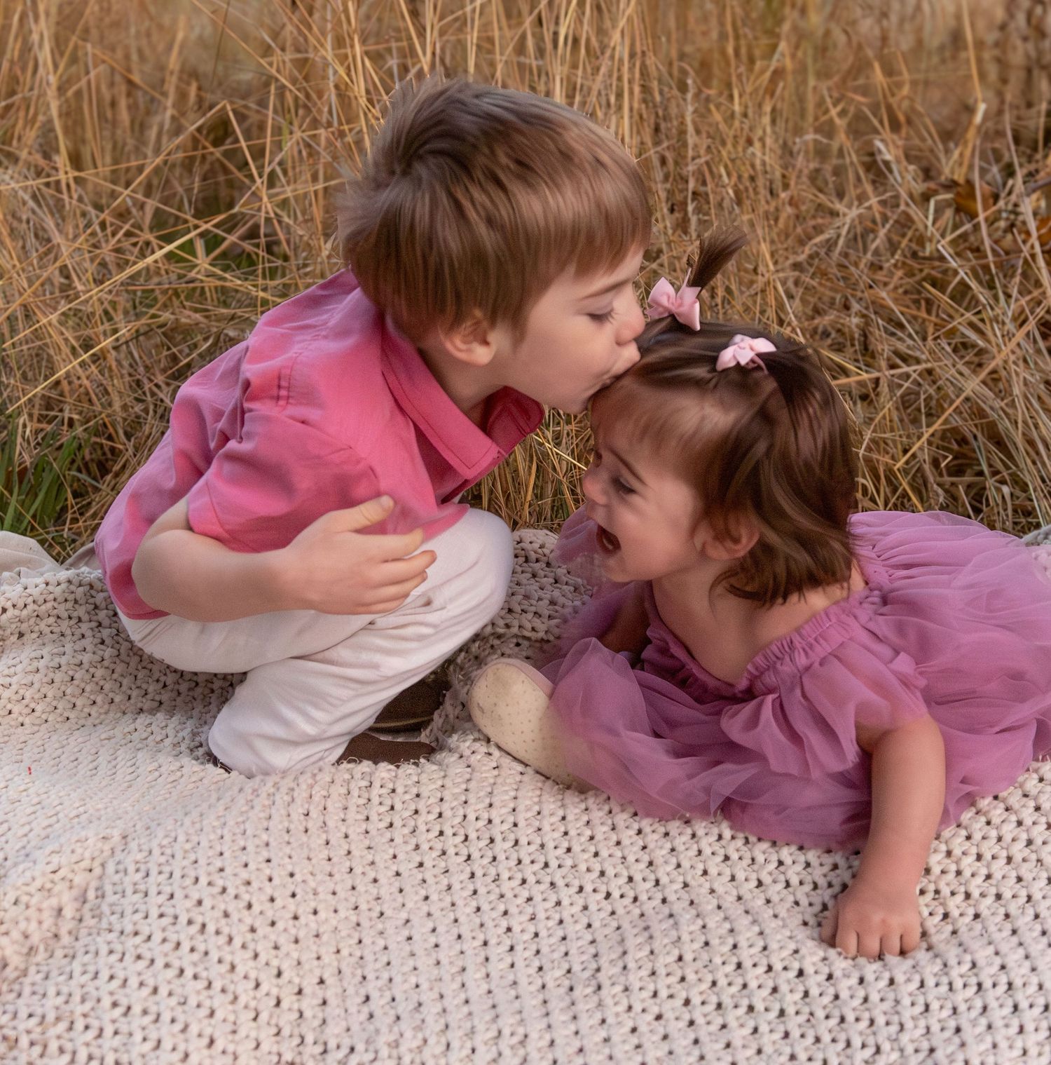 young Brother and sister posed together in a field located in Salem, OR