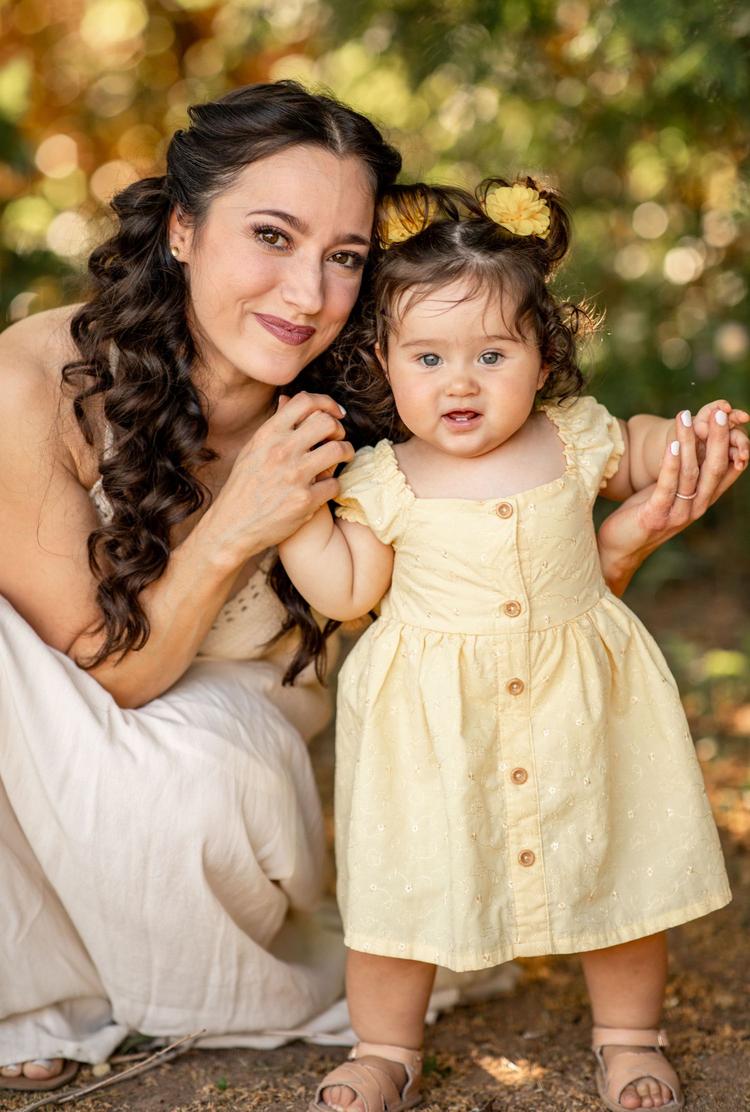 Sweet portraits showing affectionate poses and smiles with a soft bokeh nature backdrop at The Meadow in Mesa