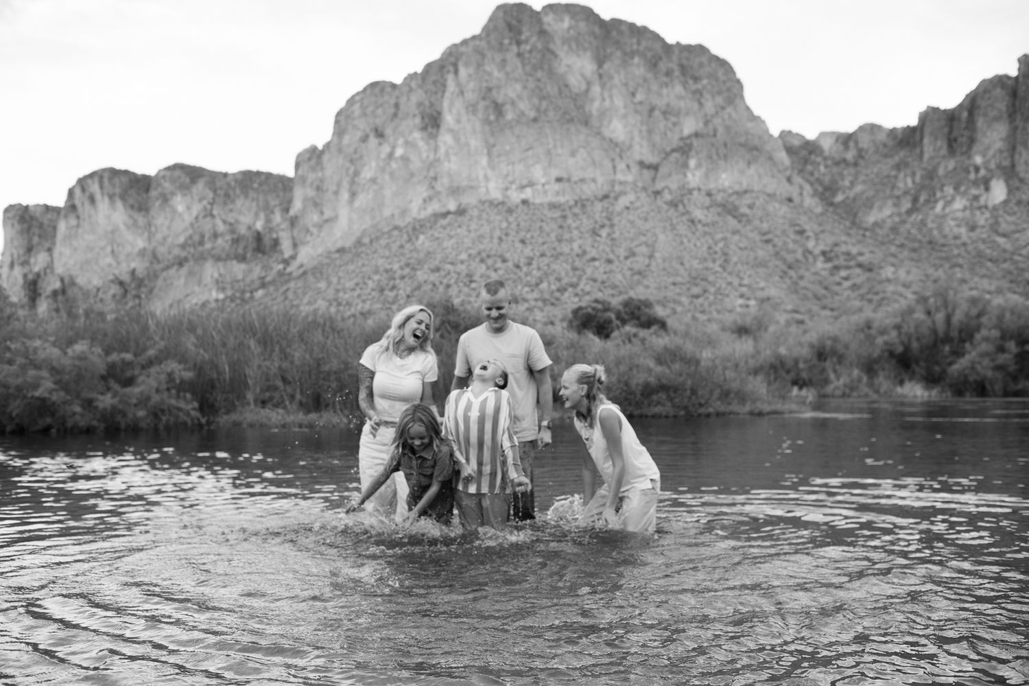 Al Carraway and her family playing in the water in the Salt River in Arizona.