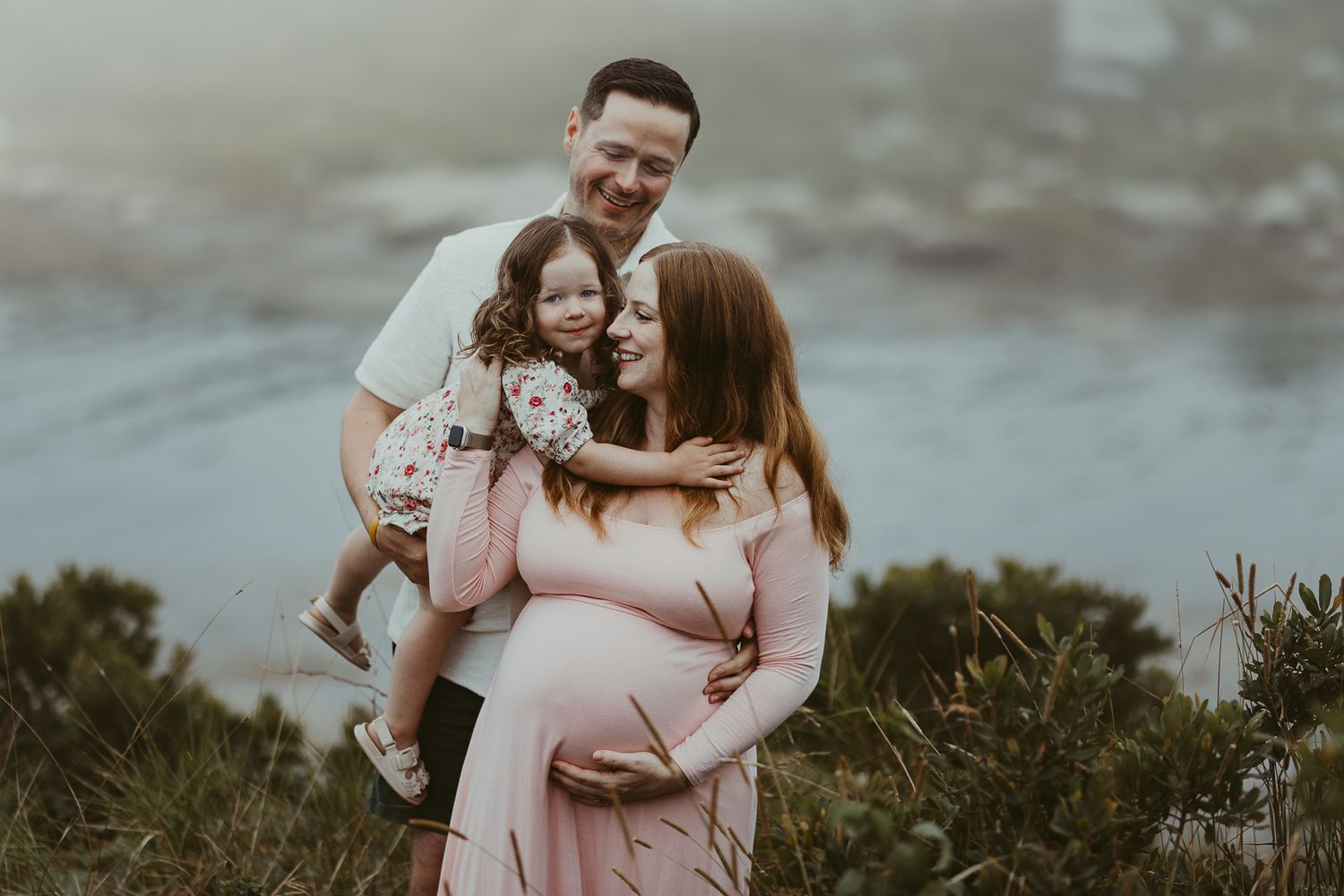 Sweet maternity photo session in an outdoor natural setting.