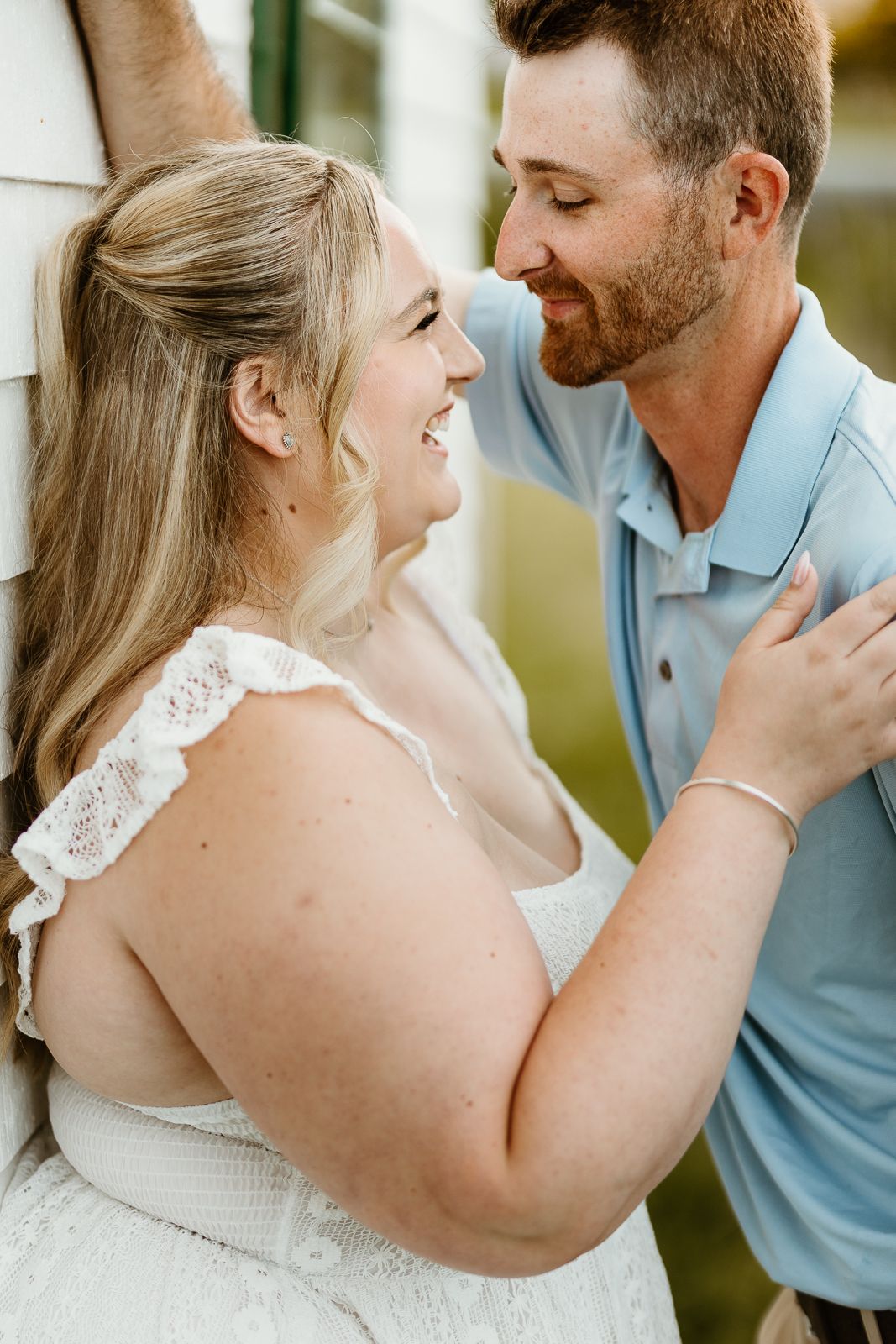 Intimate portraits showing tender moments and expressions of love outdoors.