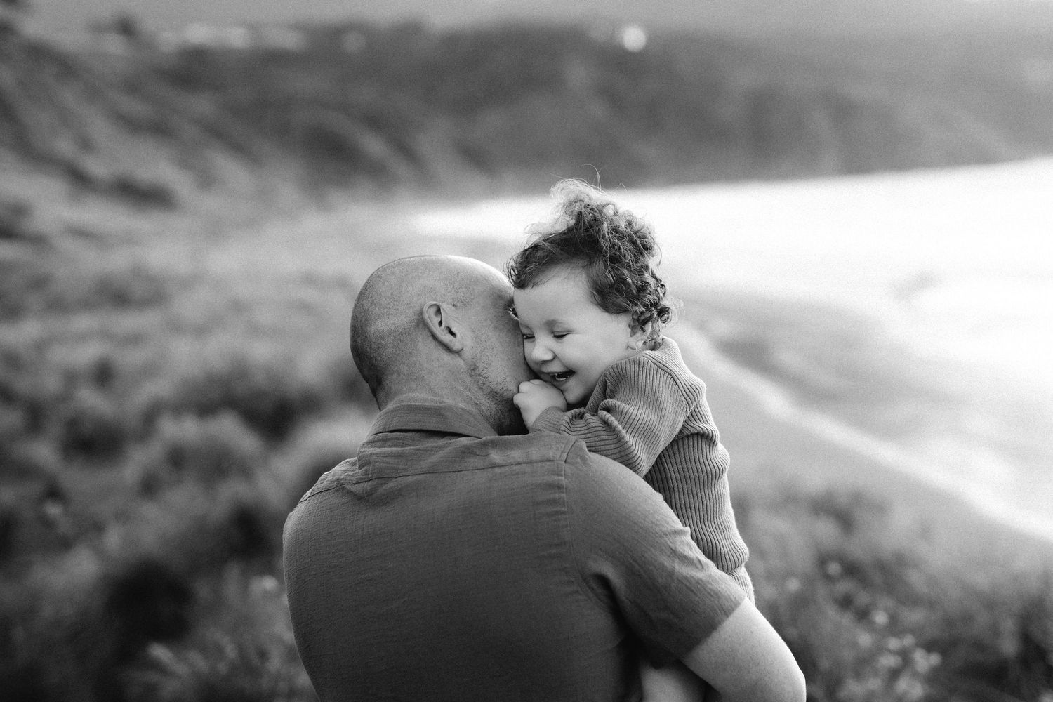 A series of black and white romantic photographs showing intimate moments between a couple on their wedding day.