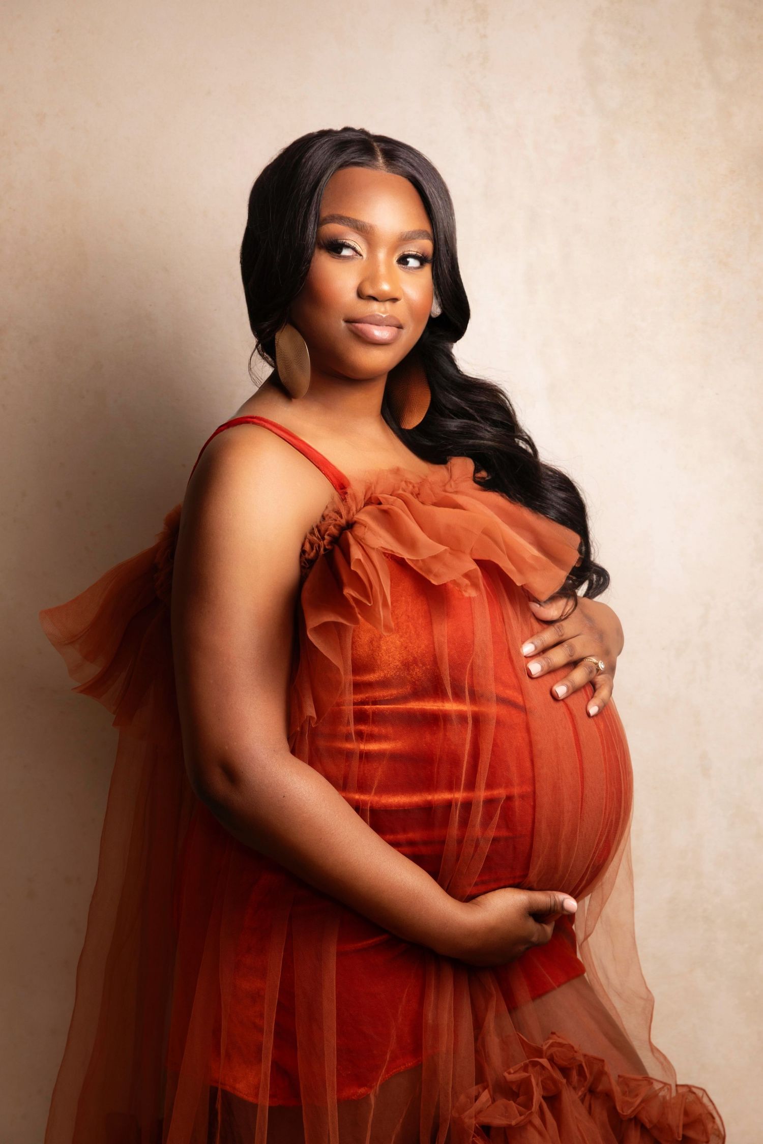 Top studio pregnancy photography in New Jersey/ New York. Outfits provided.
