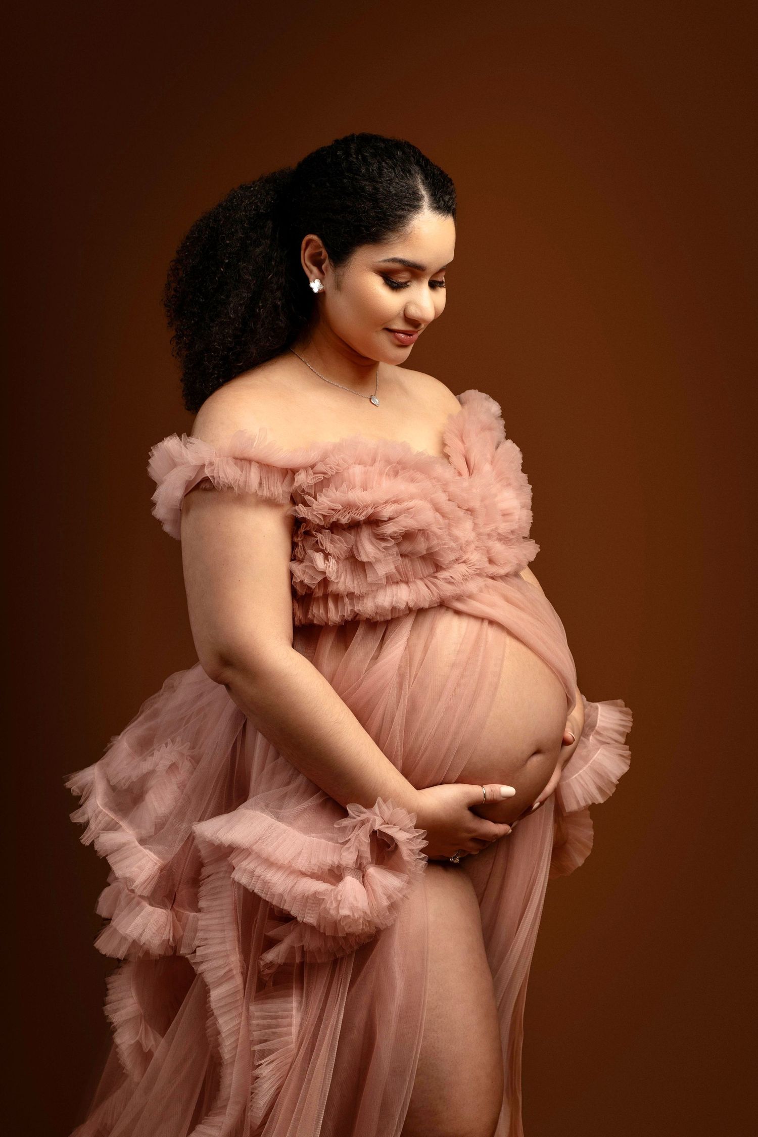 Studio pregnancy photographer in New Jersey/ New York. Outfits provided.