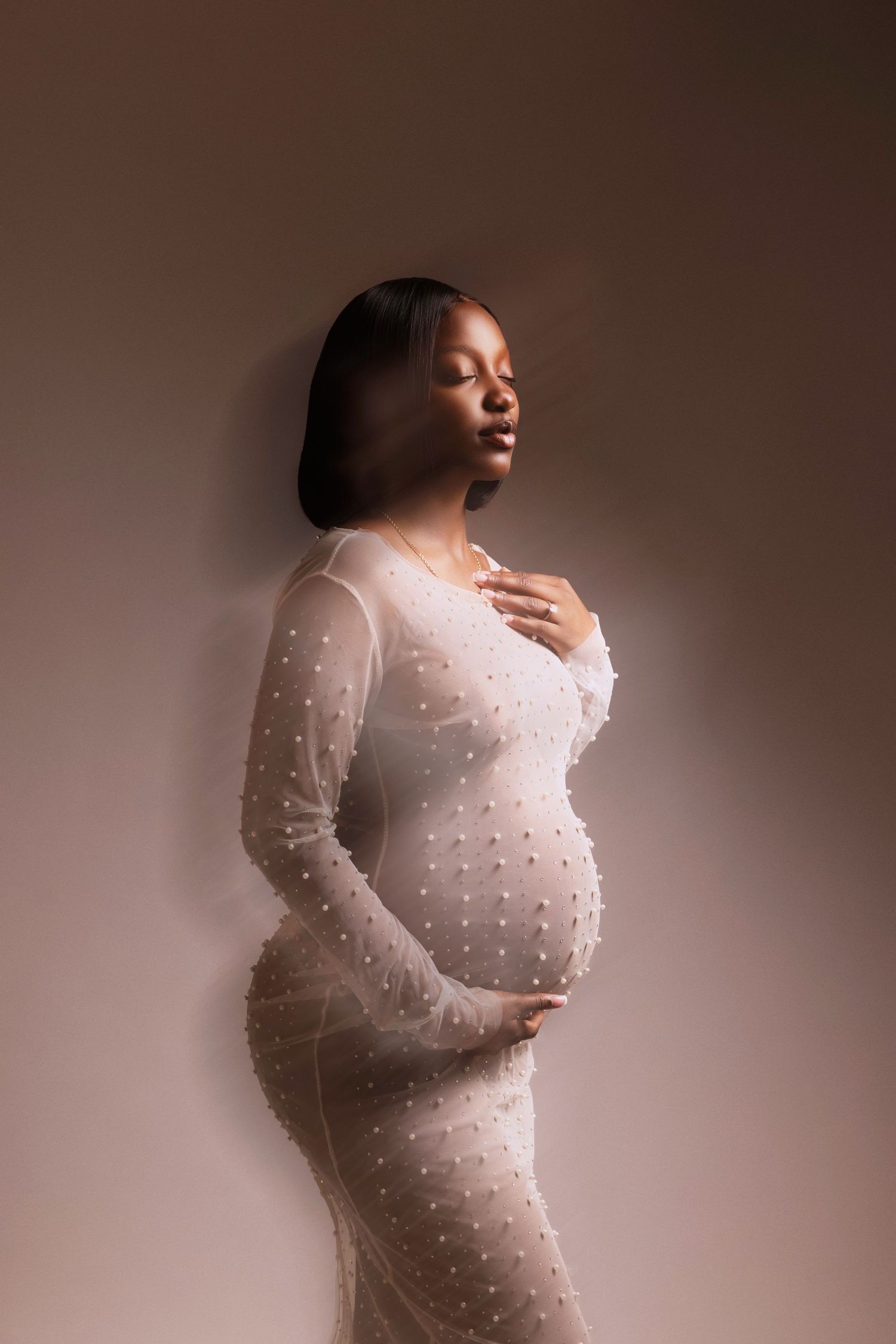 Top studio pregnancy photography in New Jersey/ New York. Outfits provided.