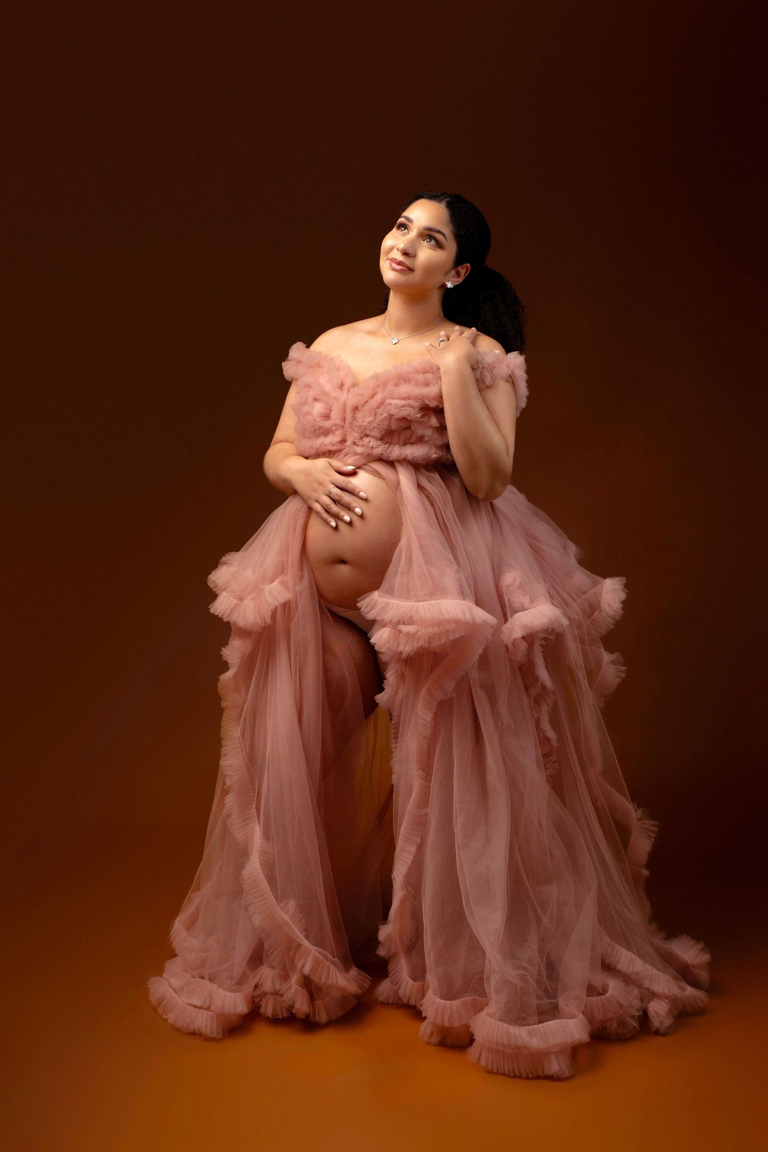 Studio pregnancy photographer in New Jersey/ New York. Outfits provided.