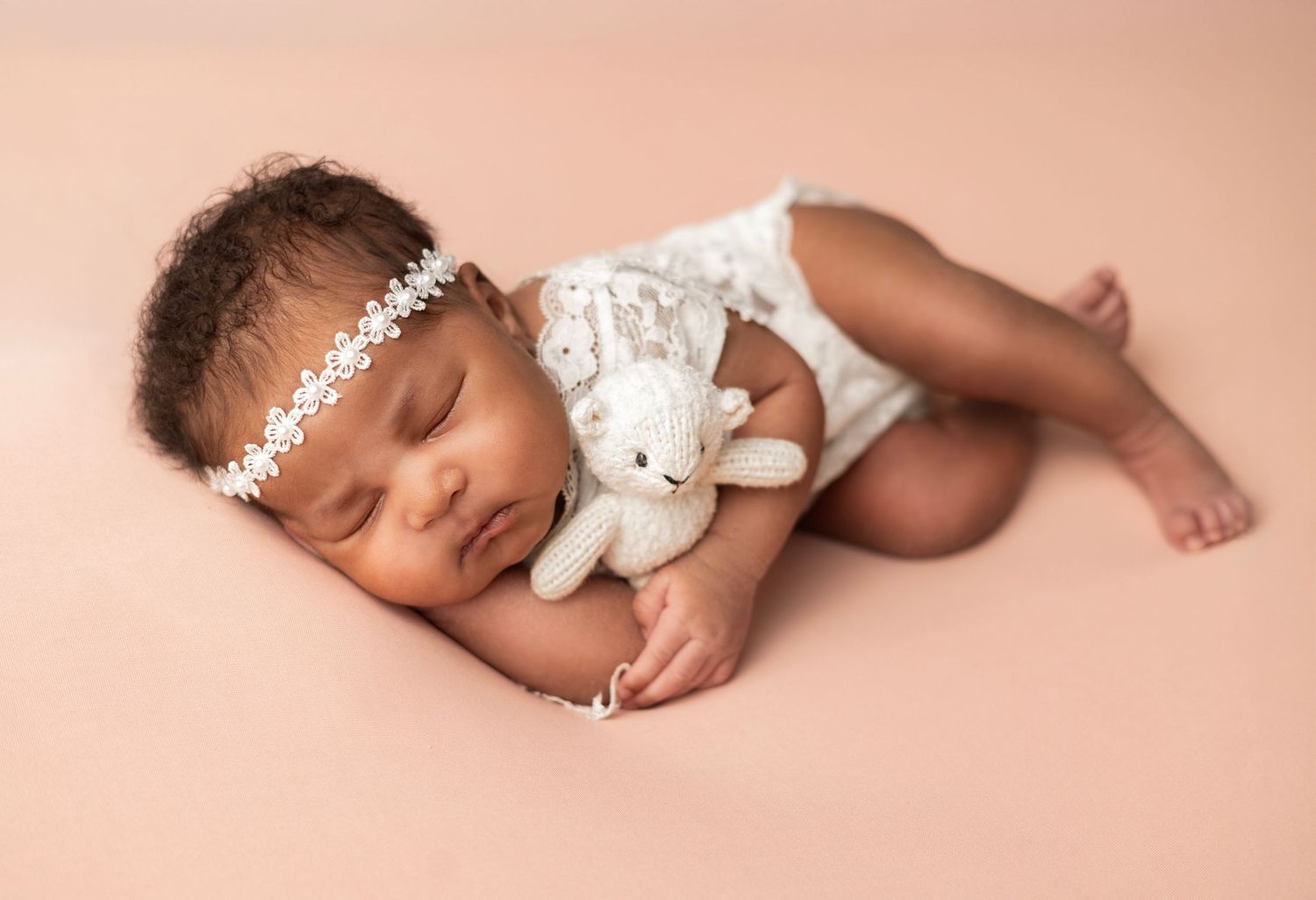 Newborn and family sessions move at your family's pace. We take all the breaks your little ones need.