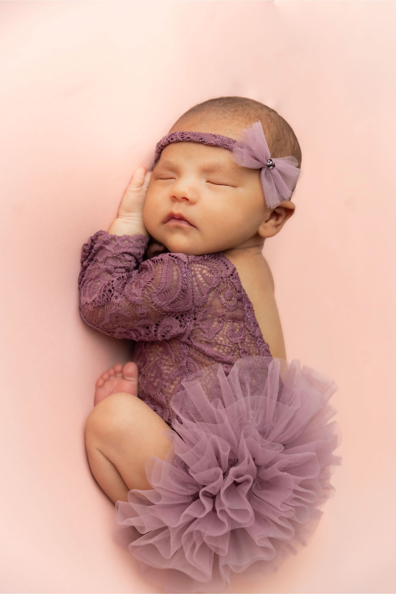 Newborn and family sessions move at your family's pace. We take all the breaks your little ones need.