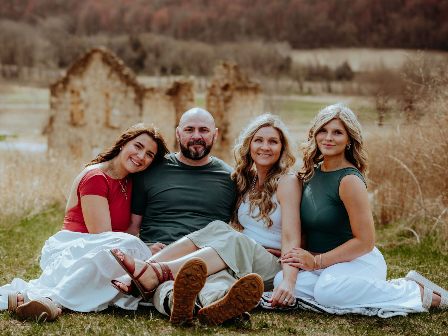 Family portrait session outdoors near Pardeeville, Wisconsin. Natural light, candid moments, and posed moments during a family session.