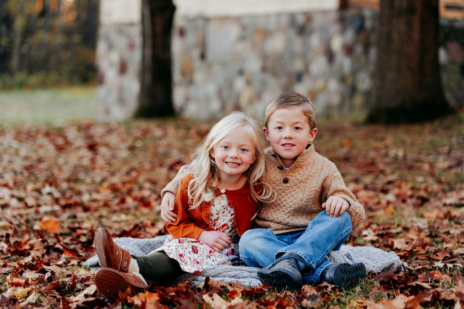 Family portrait session outdoors near Pardeeville, Wisconsin. Natural light, candid moments, and posed moments during a family session.