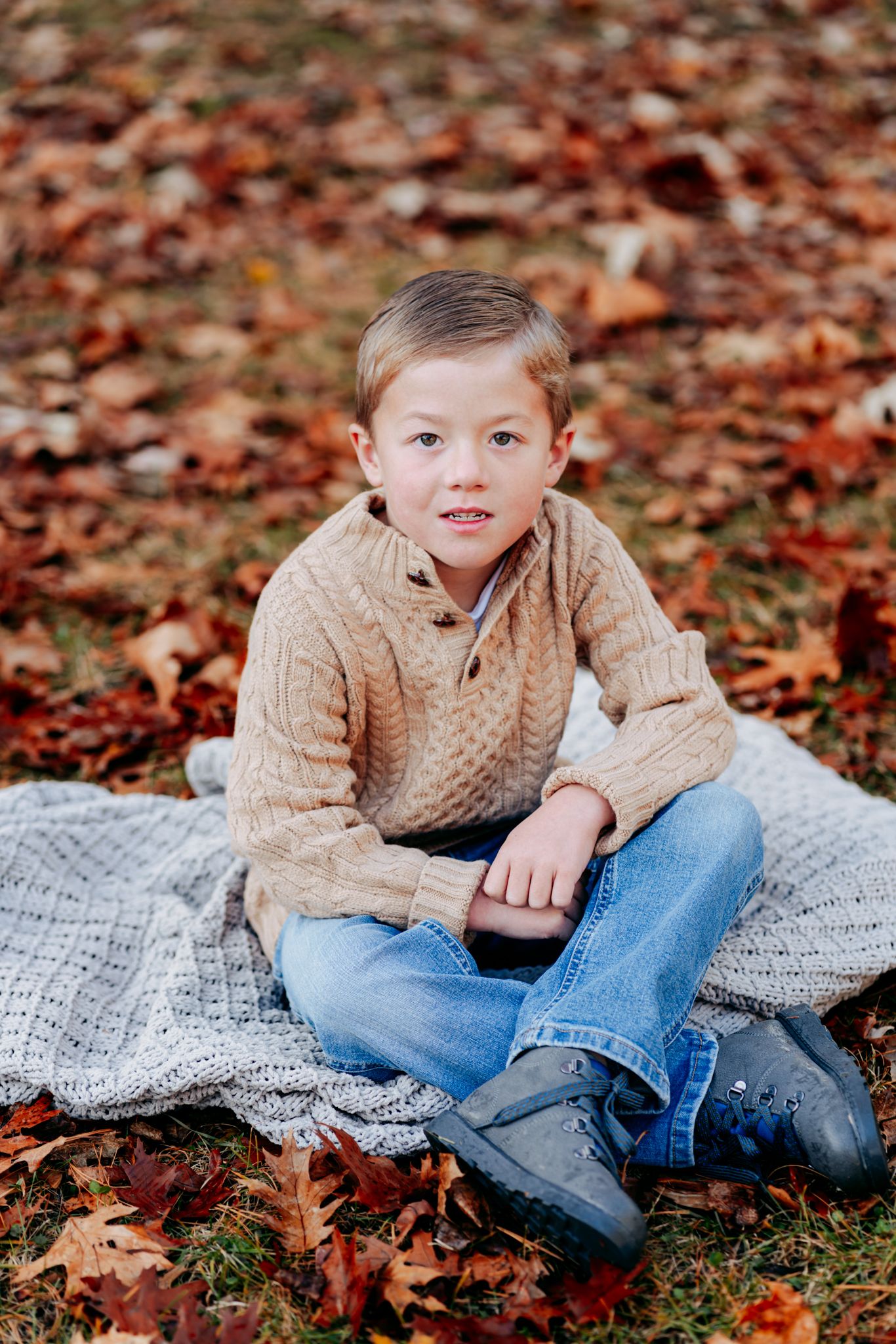 Family portrait session outdoors near Pardeeville, Wisconsin. Natural light, candid moments, and posed moments during a family session.