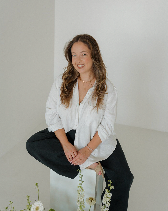 Professional portrait session in white studio showing casual poses and expressions against a minimalist backdrop.