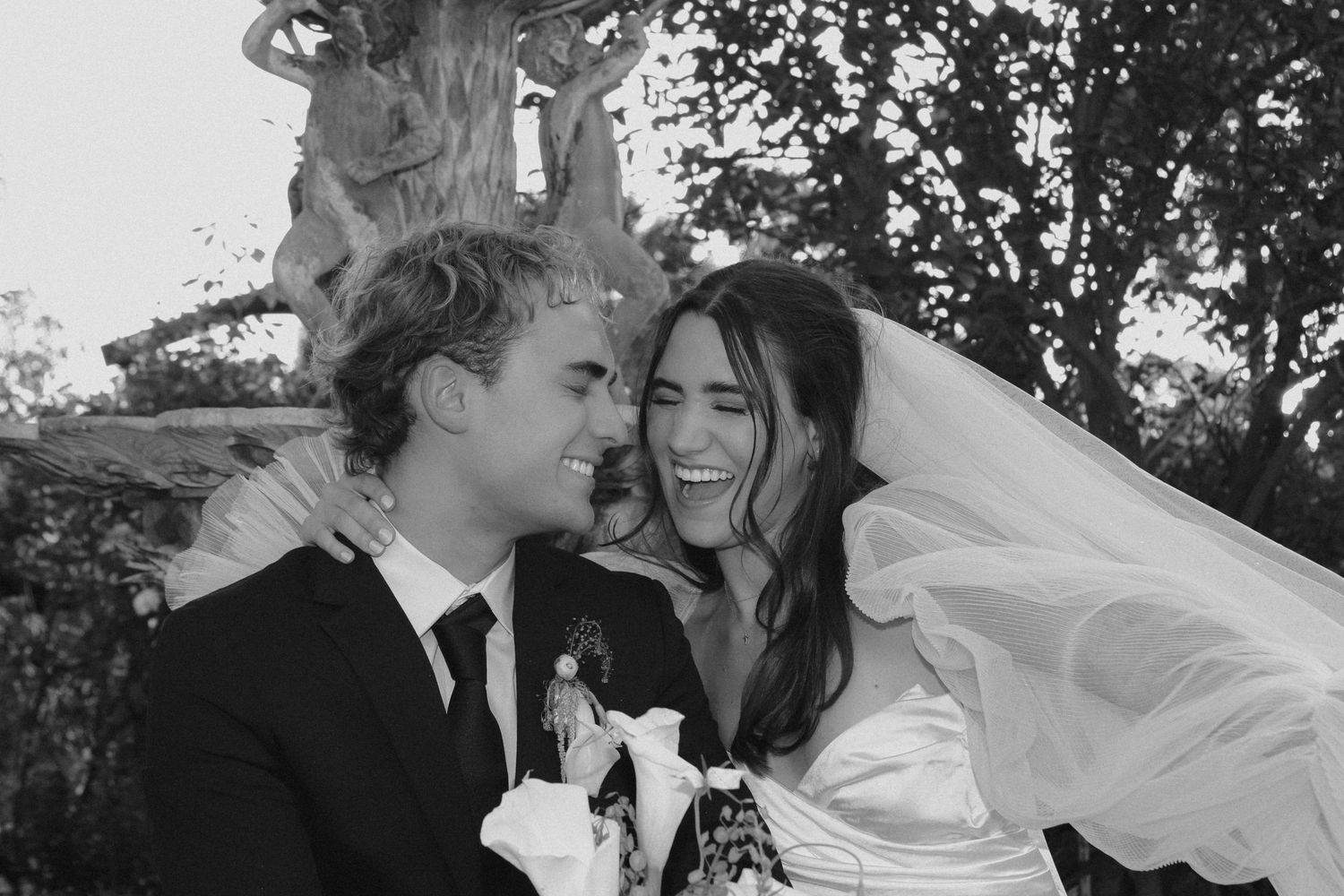Tyler Garlej Photography - Black and white wedding photographs showing joyful moments between newlyweds during their celebration.