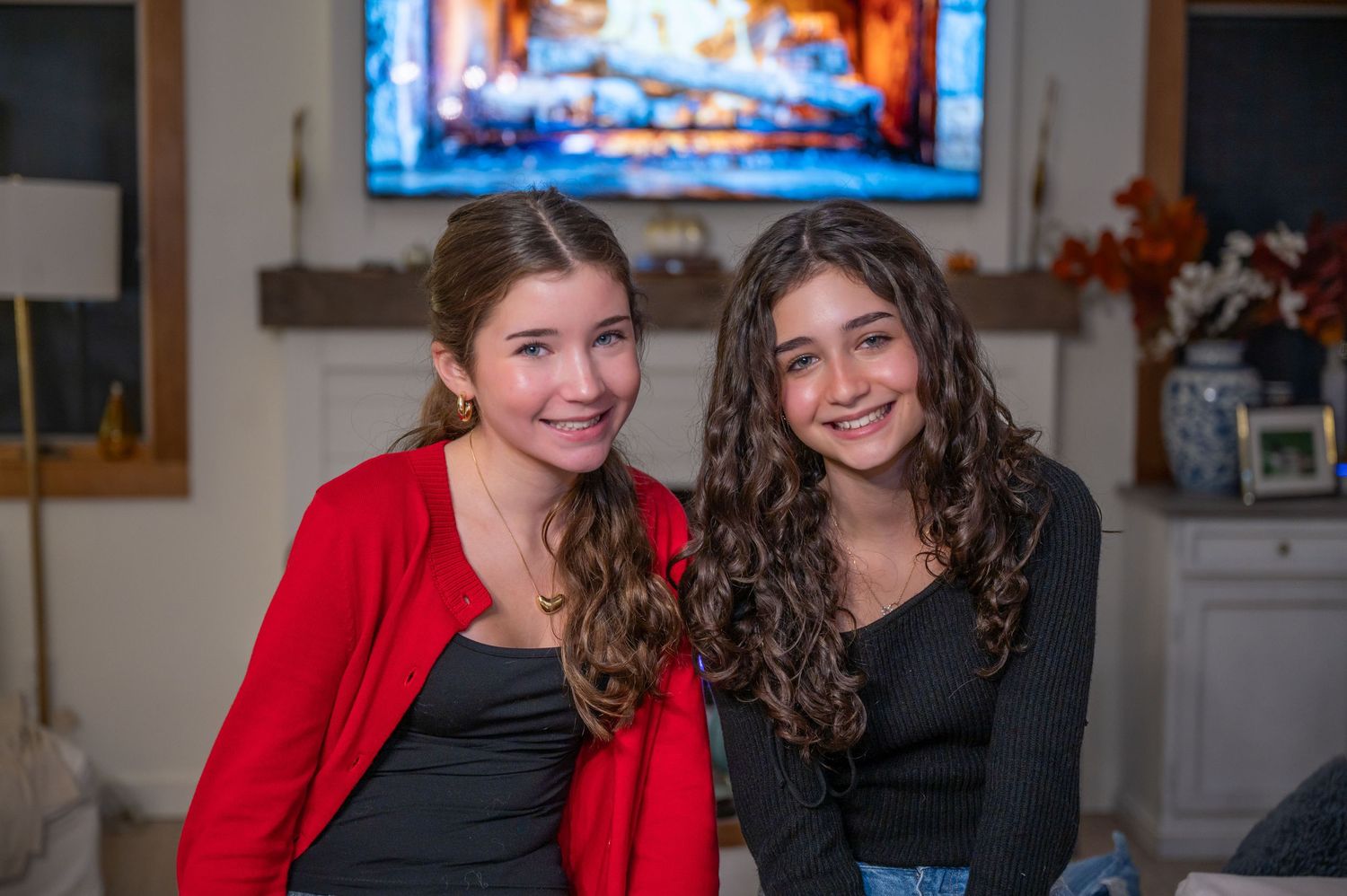 2 sisters posing for a true to color family photo