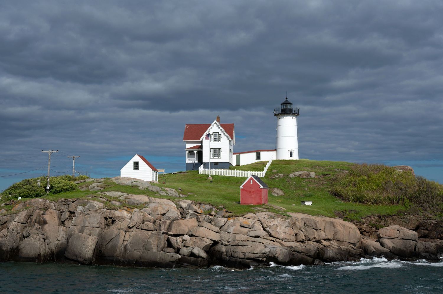 Stormy clouds at Nubble Lighthouse in York, Maine