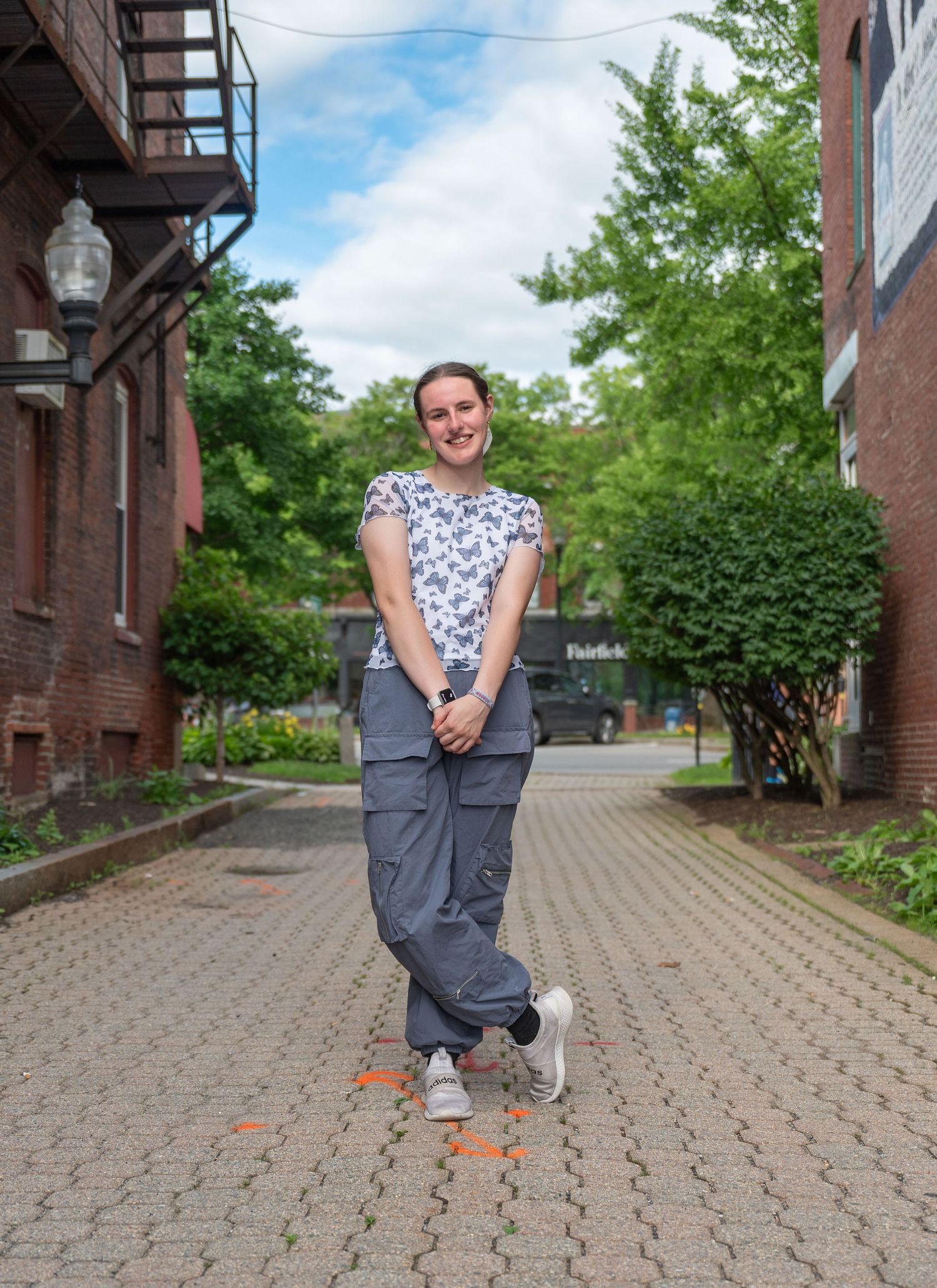 A girl posing in a downtown alley in Keene, New Hampshire