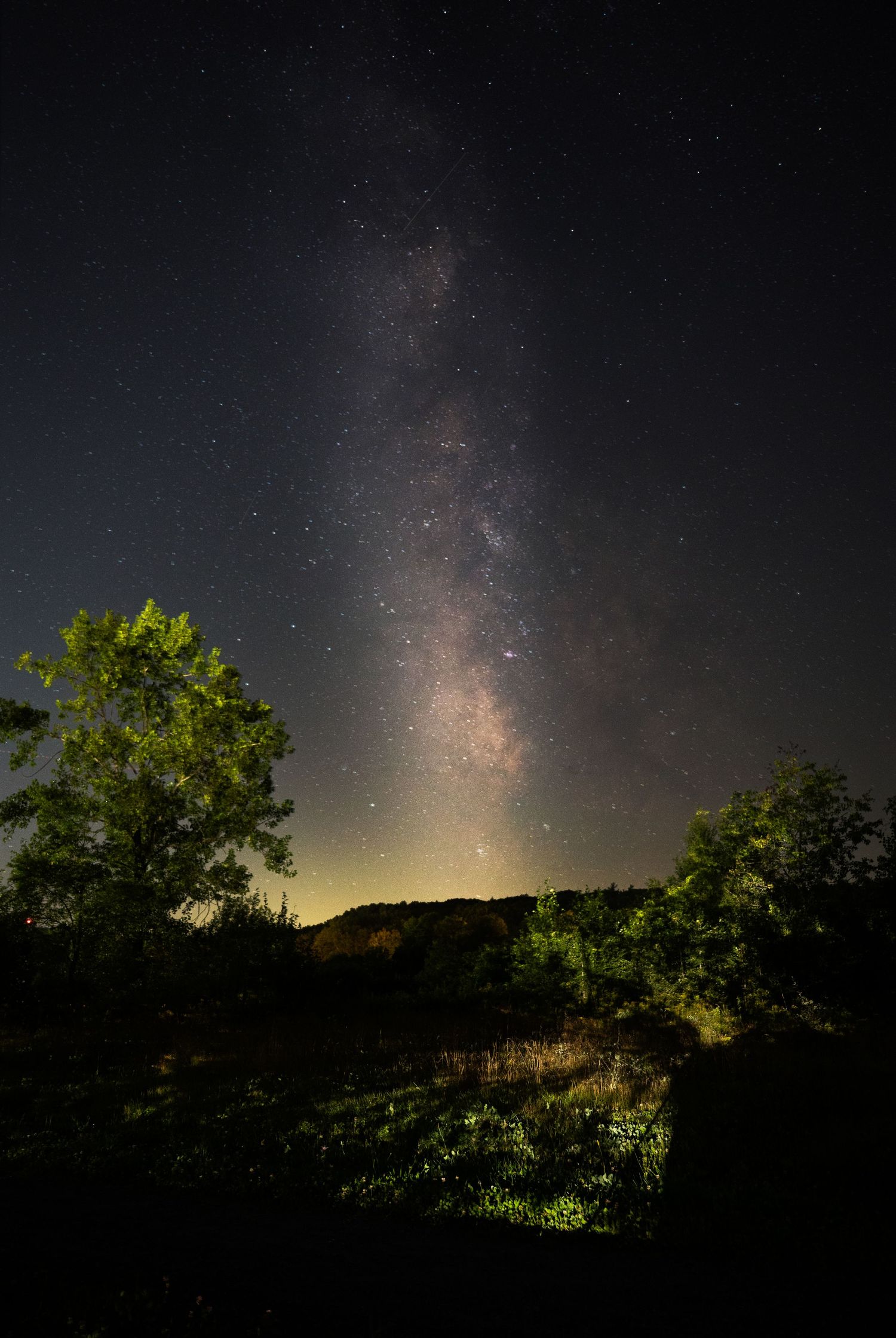 A photo taken of the Milky Way in west Keene, New Hampshire. It is late at night at the end of summer.