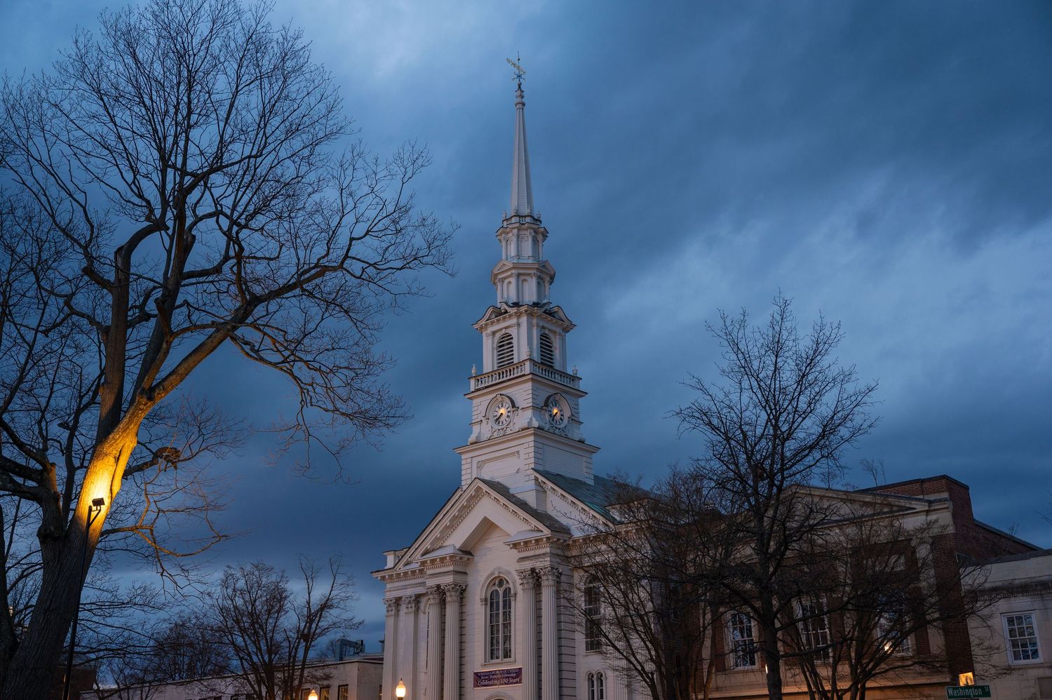 A true to color photo of a stormy evening passing through downtown Keene, New Hampshire.