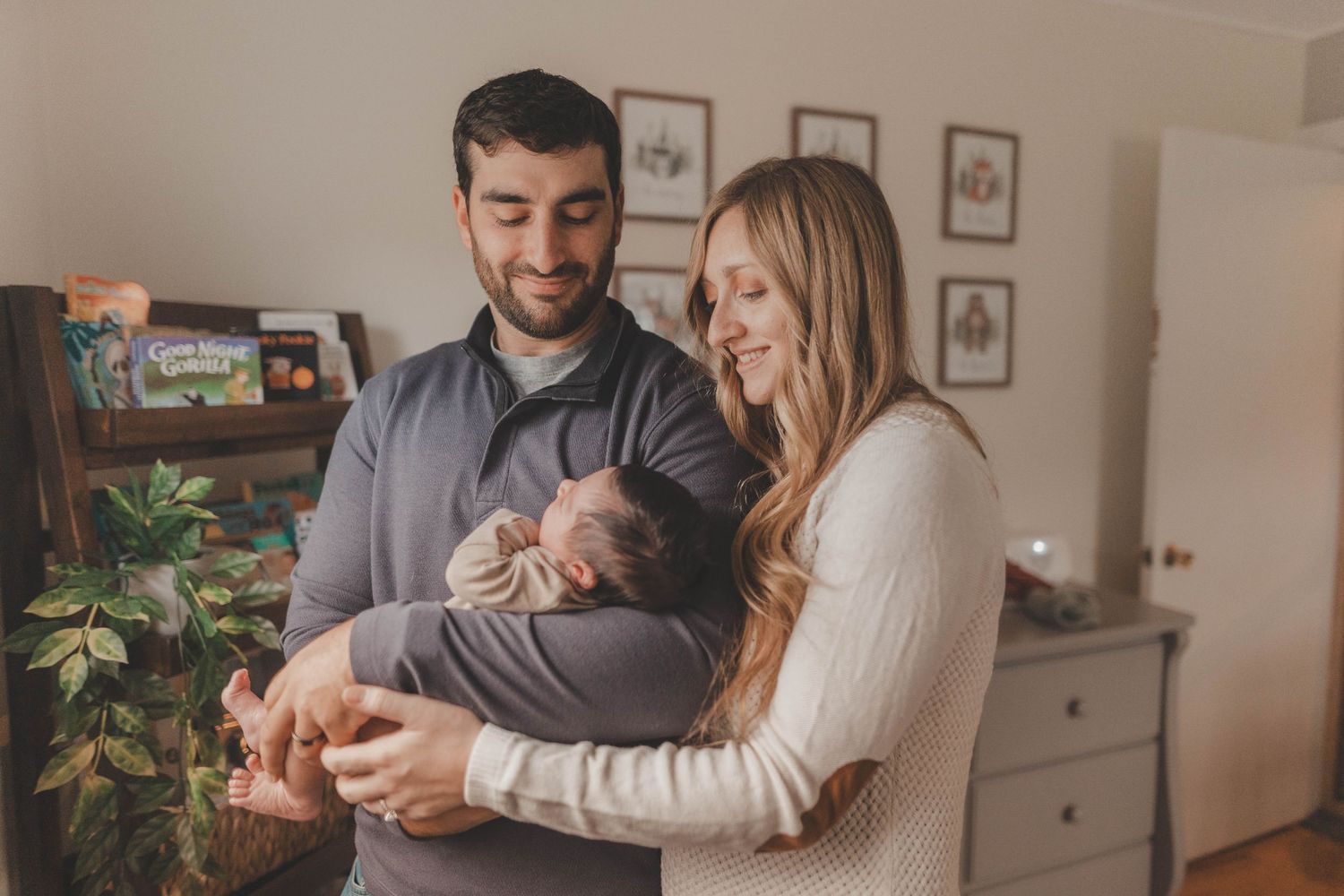 In-home baby portrait session near Littleton, NH highlighting newborn features in natural window light.
