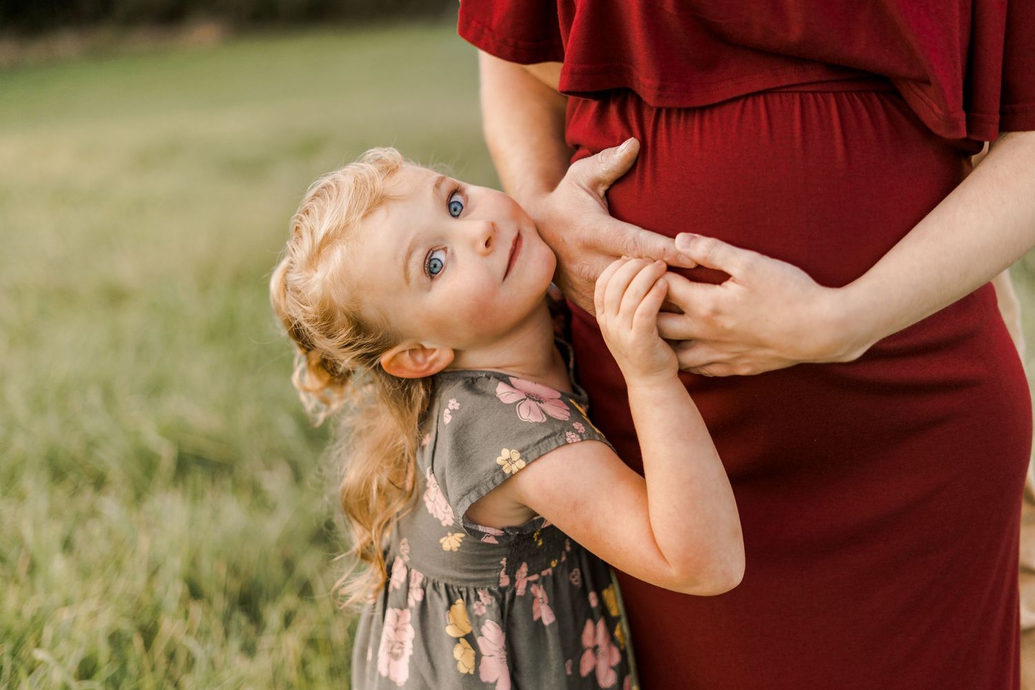 Motherhood photography in Littleton, New Hampshire capturing a mother and child embracing in natural light.