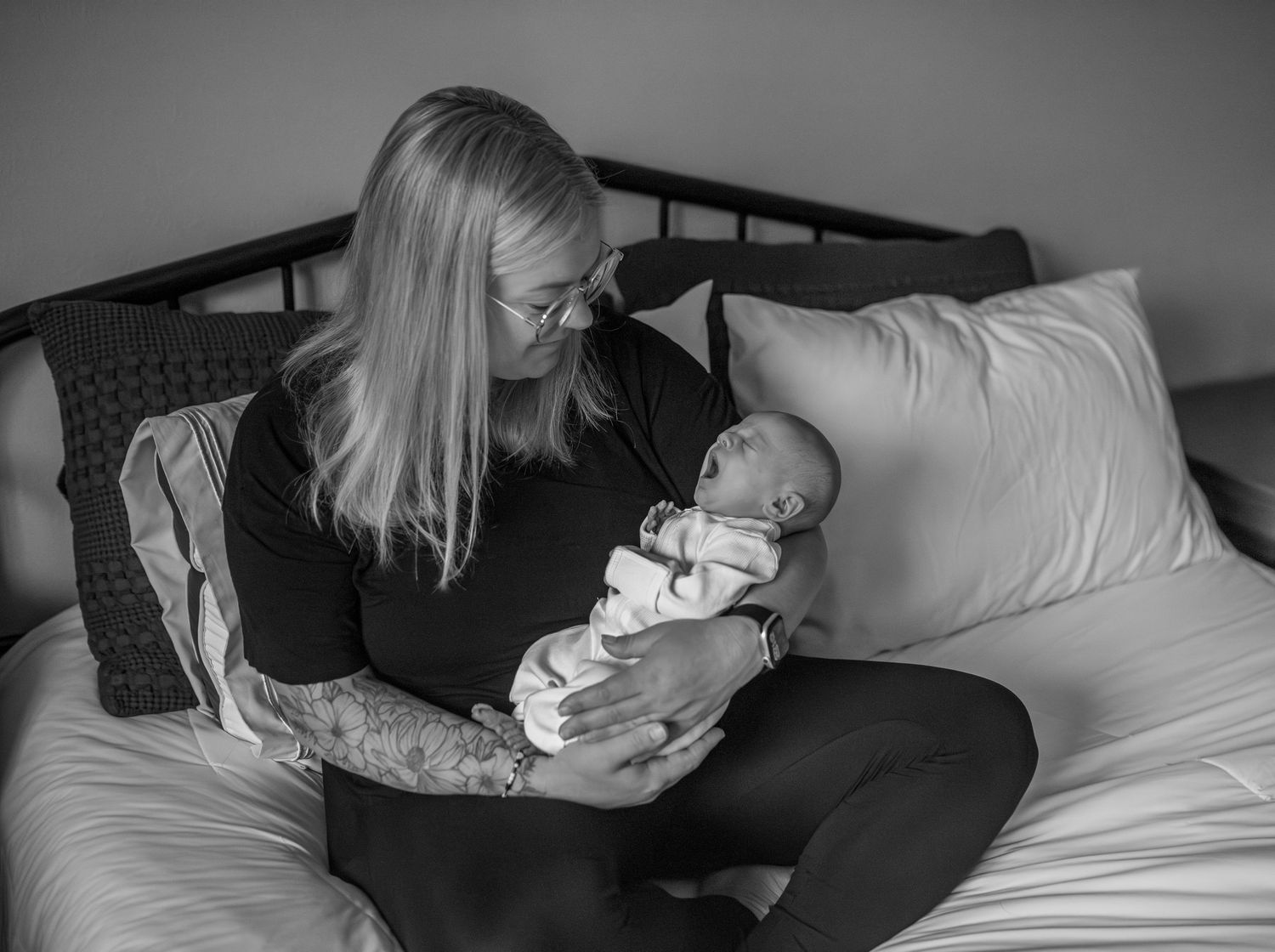 mother holding newborn