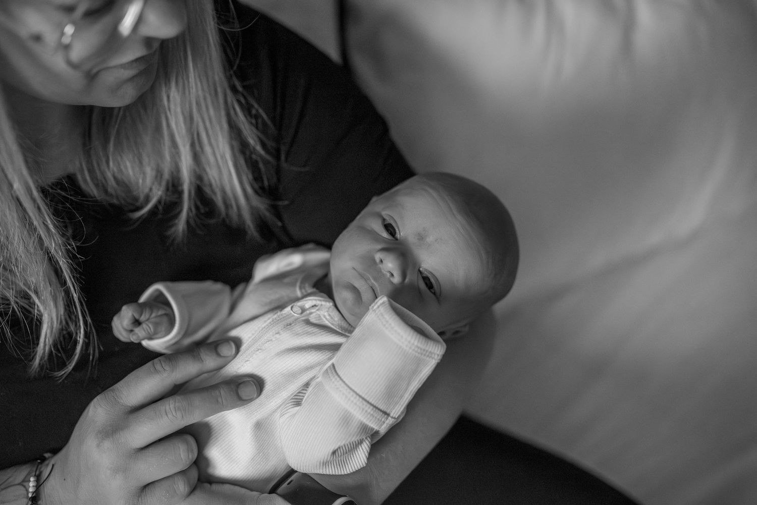 mother holding newborn