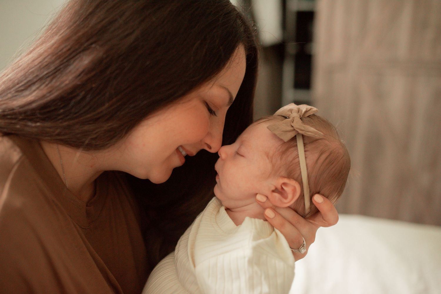 nose to nose mother and newborn