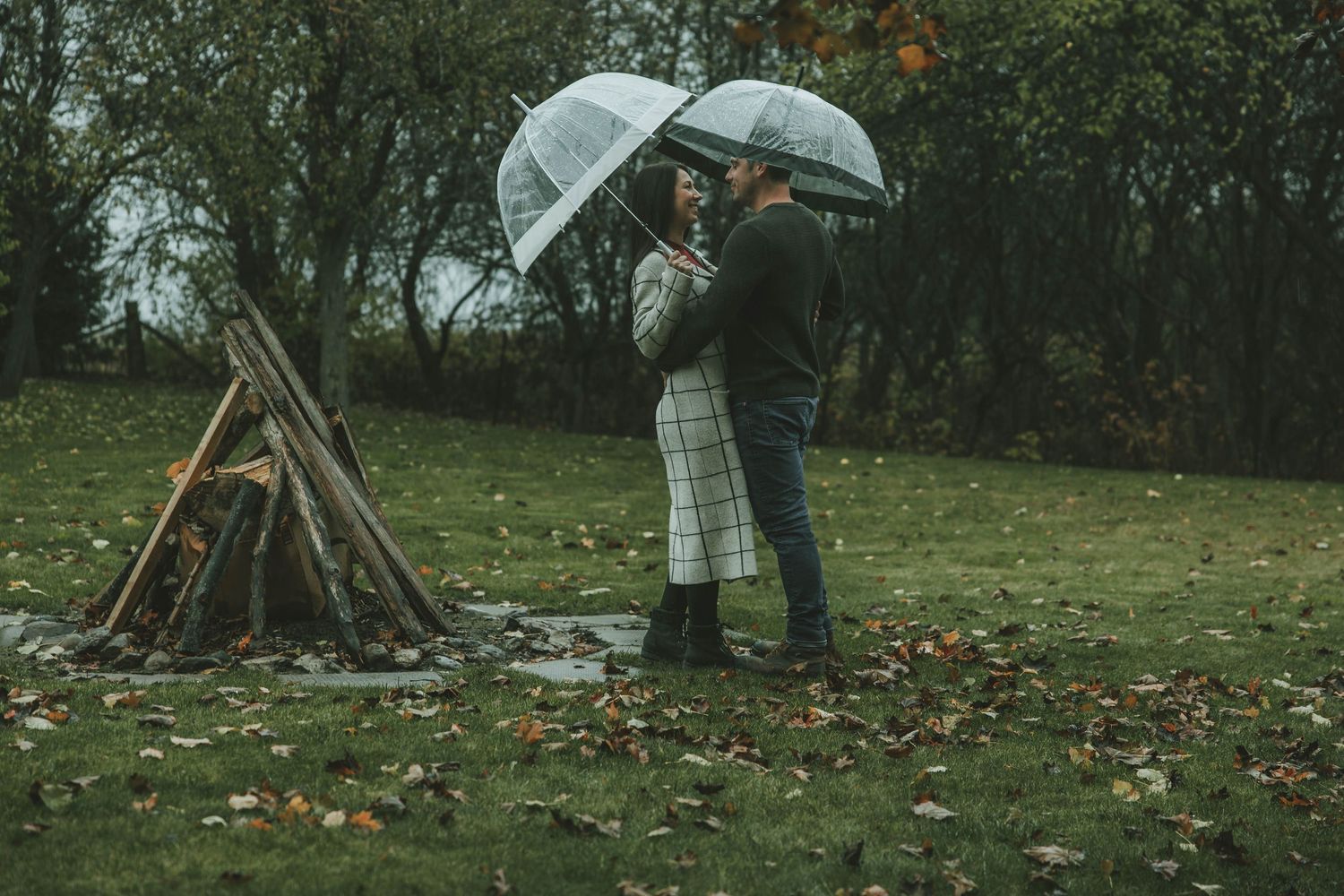 A sequence of autumn photos showing someone picking pumpkins in a field on an overcast day.