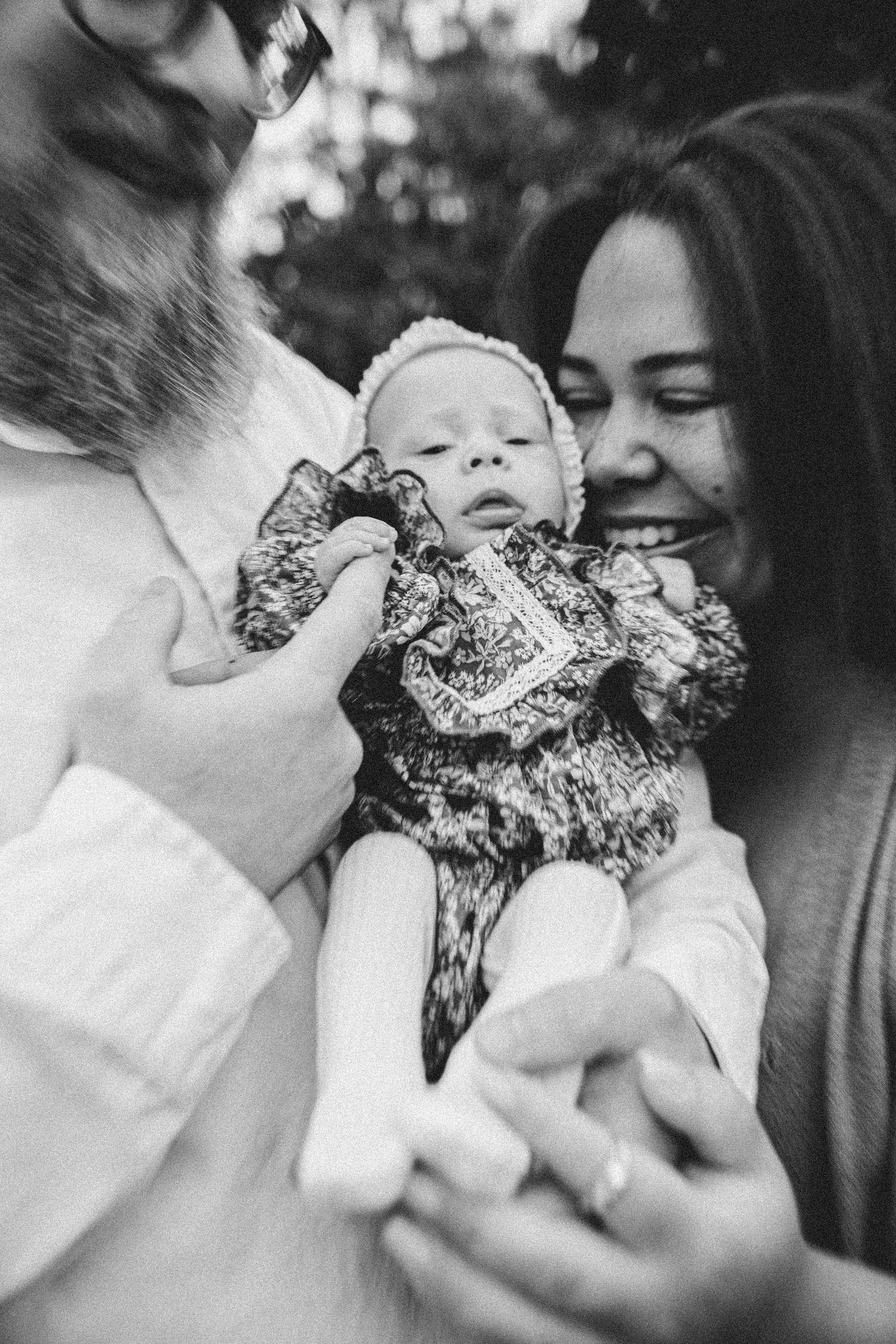 A series of four black and white intimate photos showing the sharing of a piece of pie or cake in a playful moment.