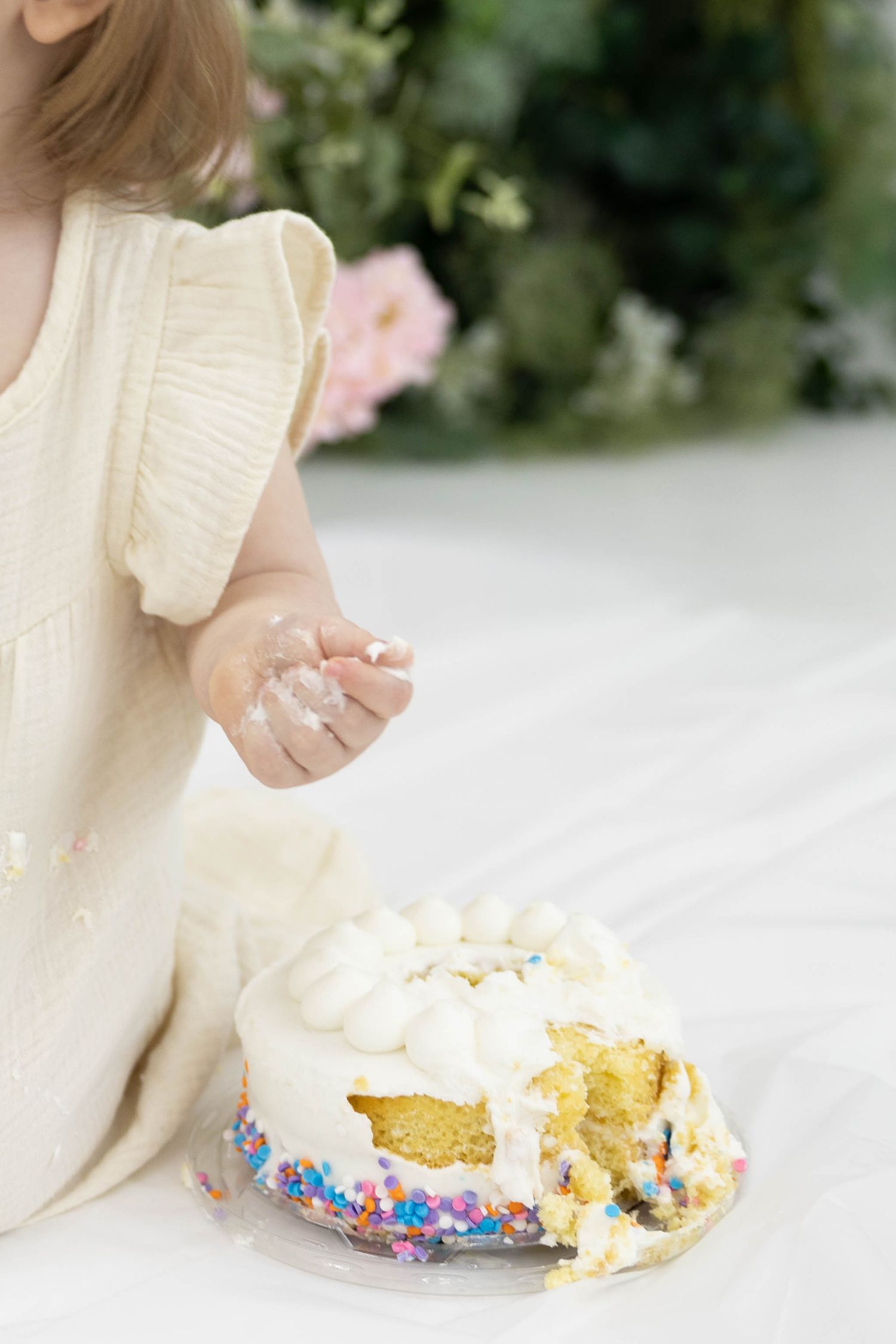 A sequence of images showing a slice of vanilla cake with sprinkles being eaten in progressive bites.