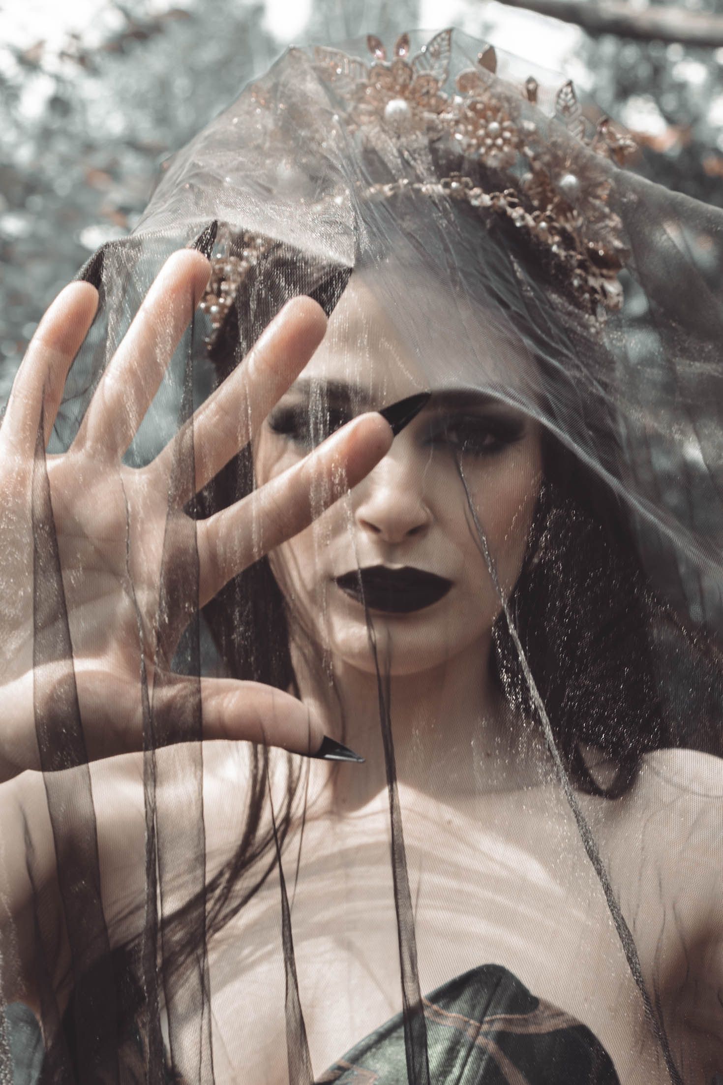 Artistic monochrome collage showing multiple overlapping views through rain-covered glass with moody atmospheric lighting.