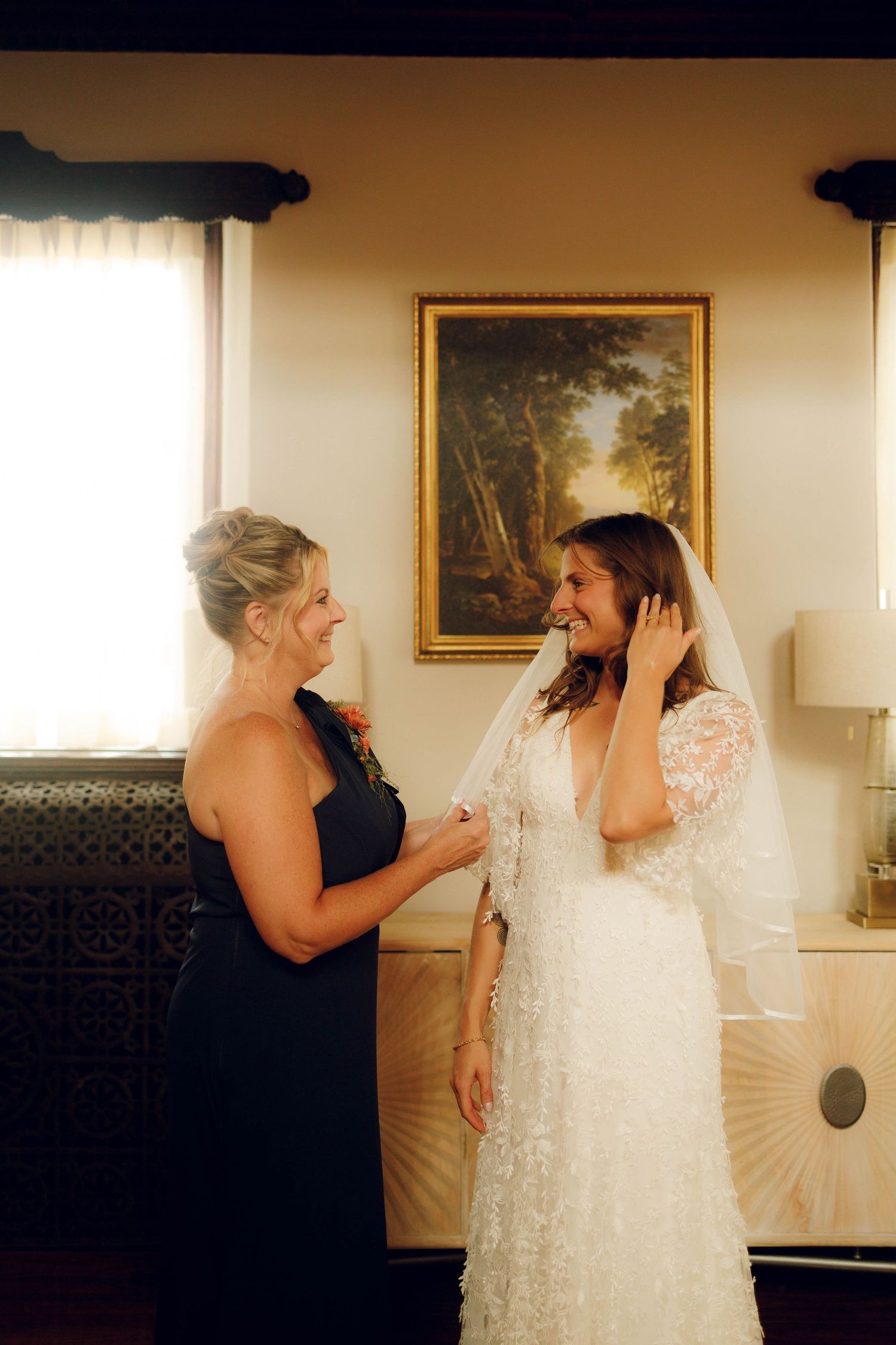 A sequence of emotional moments between two people sharing tender interactions in a room with framed artwork.
