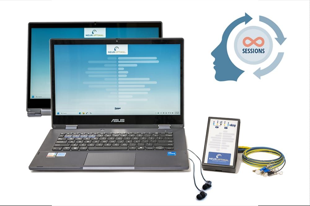 A row of laptops, computer monitors, and tech devices connected with cables on a white background.