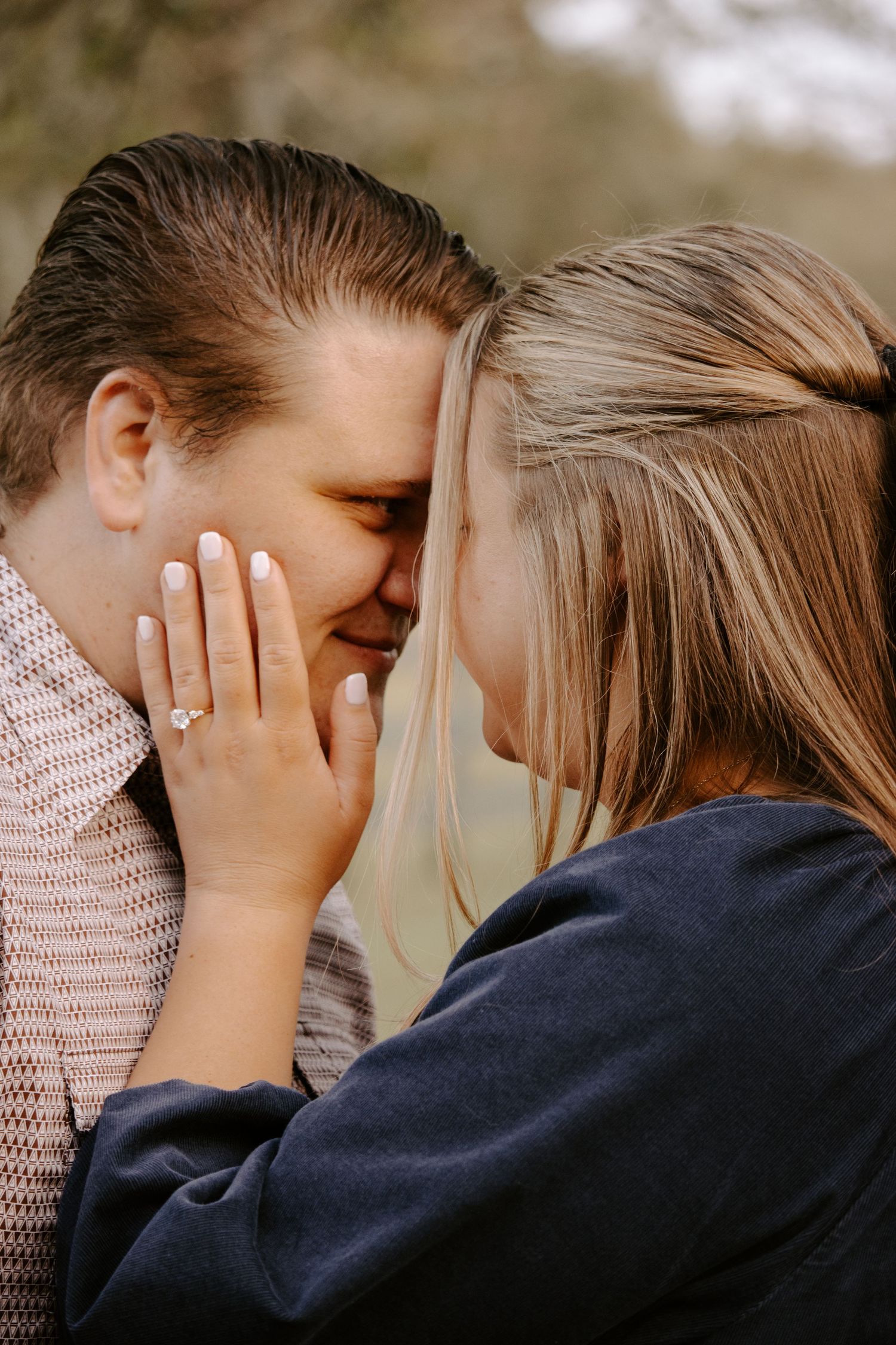 Close-up emotional engagement photography sequence showing hands with engagement ring.