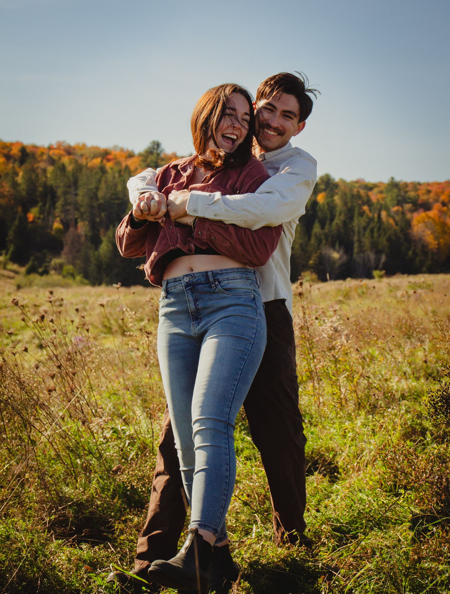 couple in fall landscape