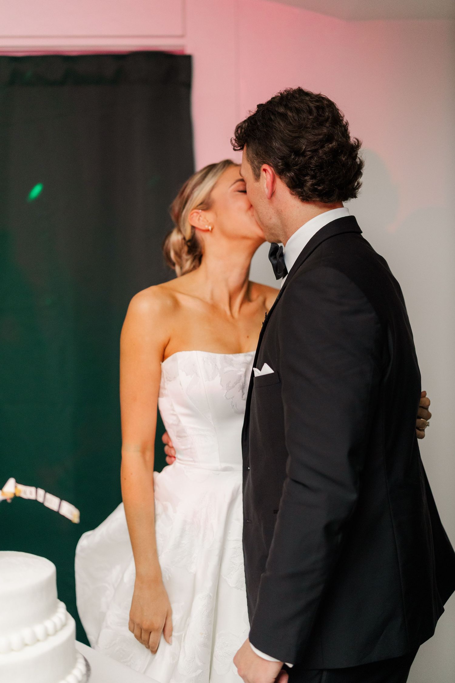 Romantic first dance moment between newlyweds at their wedding reception.