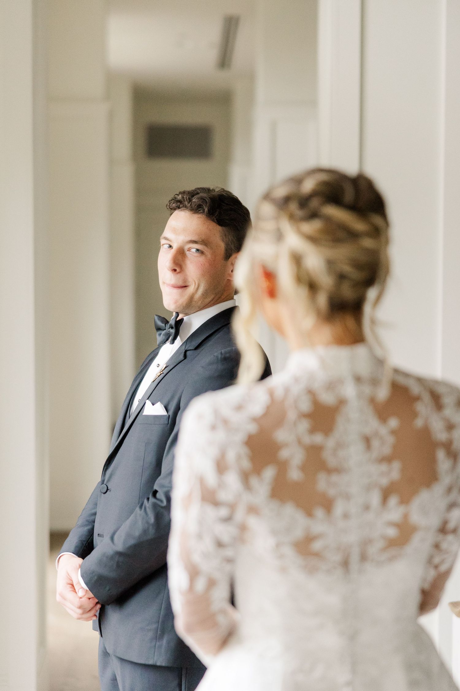 A joyful first look reaction captured in a series of intimate moments.