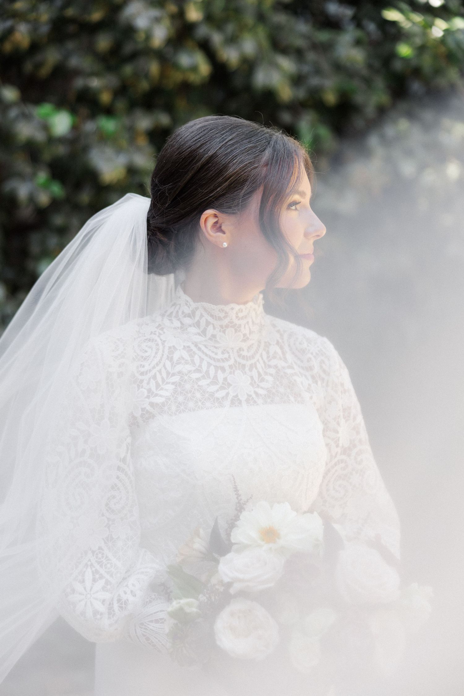 A series of ethereal bridal portraits showing a white lace wedding dress and flowing veil against a soft natural background.